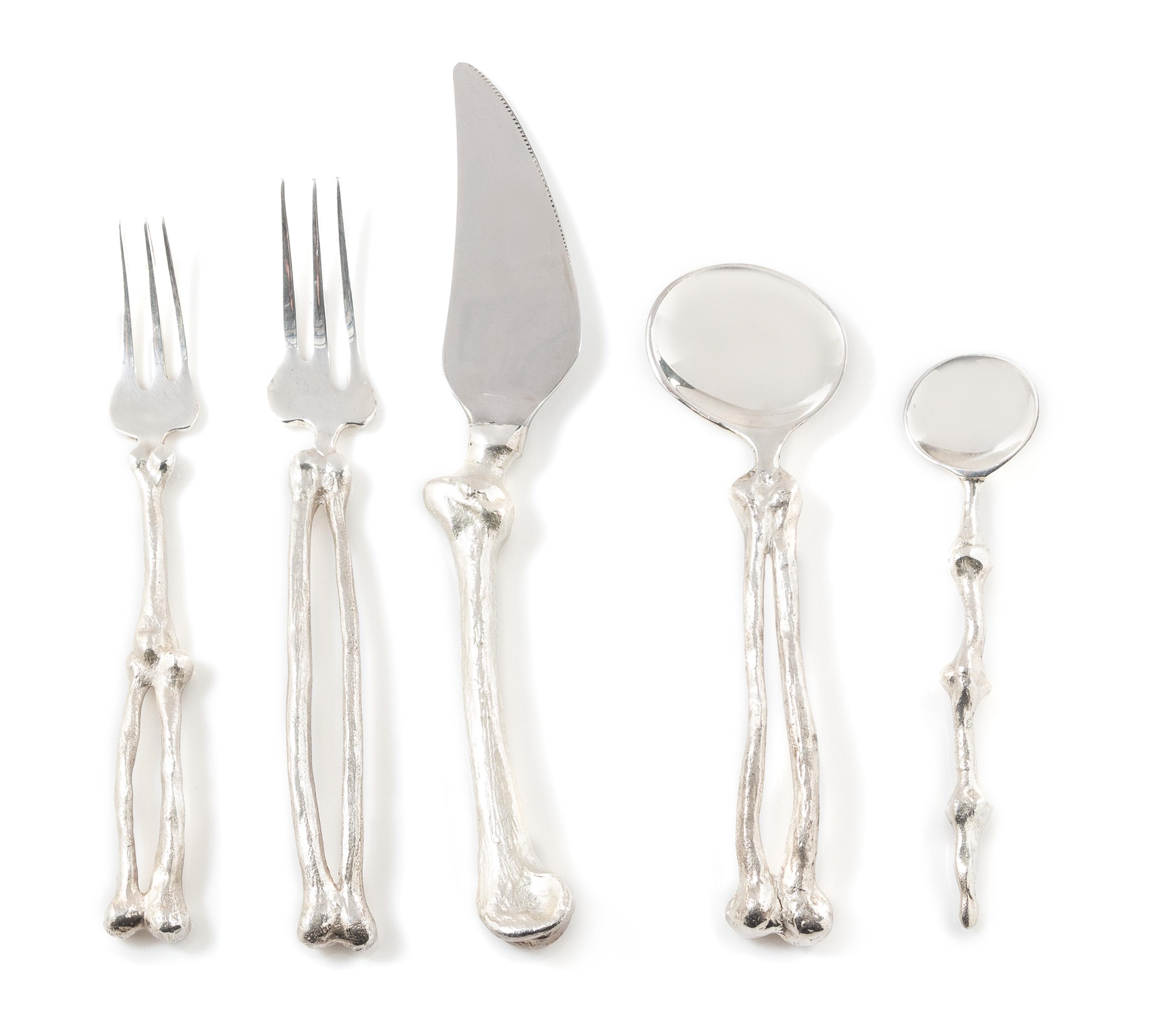 A Michael Aram Pewter Flatware Service Length of knives 9 1/4 inches. — 1997