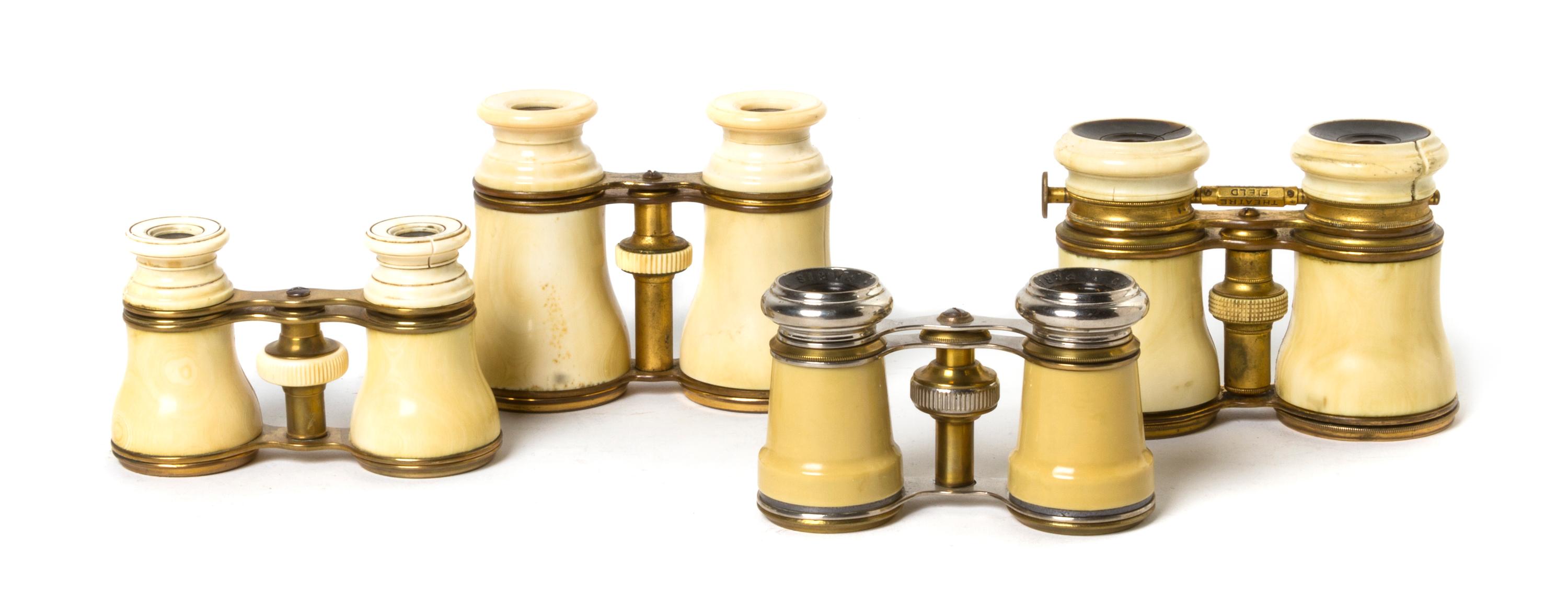 Four Pairs of French Ivory Veneered Opera Glasses, Width of widest 4 1/2 inches.