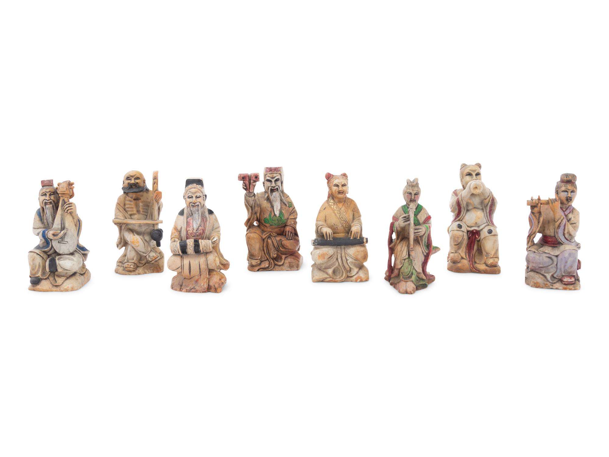 A Set of Eight Chinese Painted Soapstone Figures of Daoist Immortals