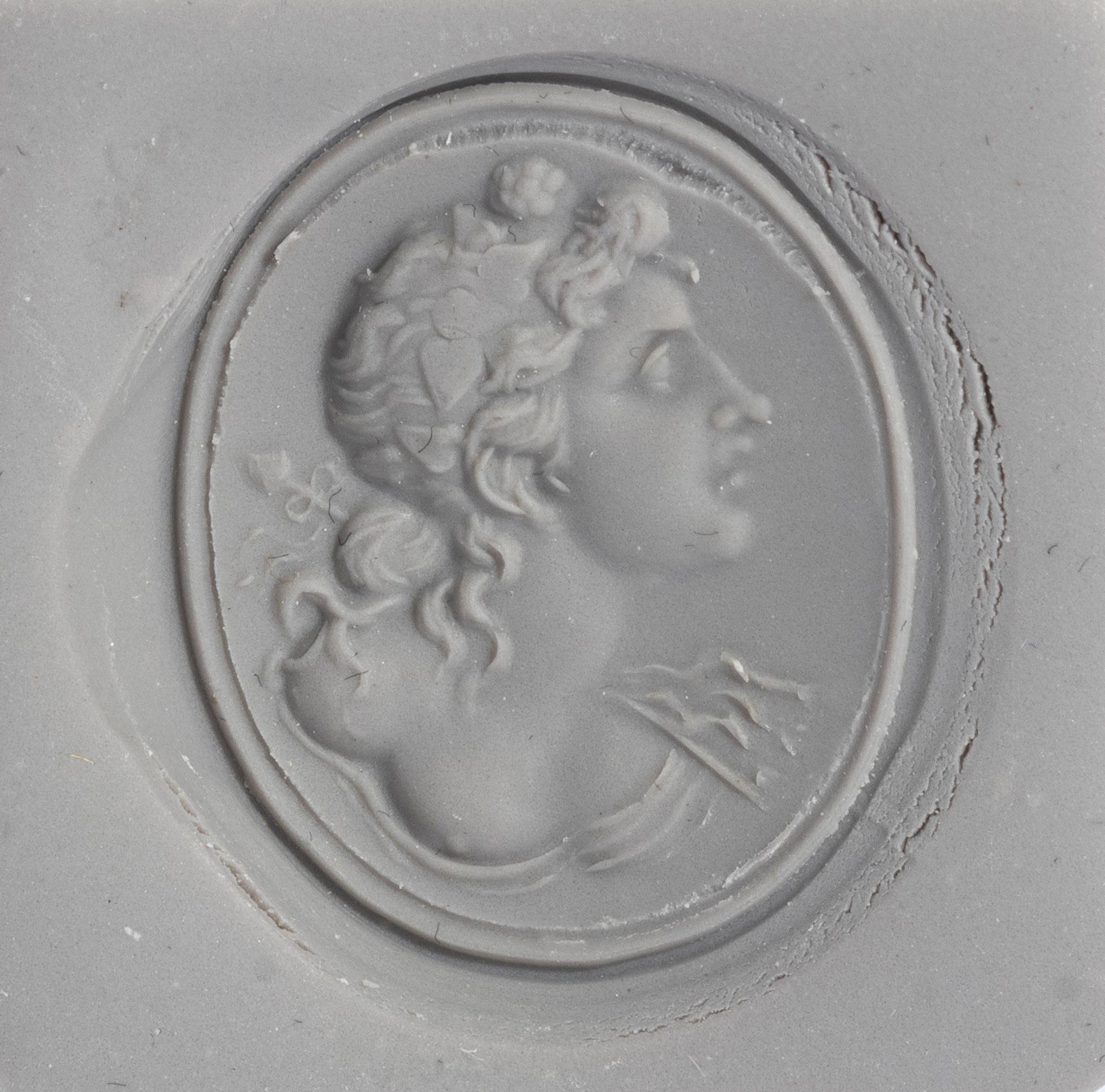 A Neoclassical Amethyst and Gold Finger Ring with the God Dionysos
