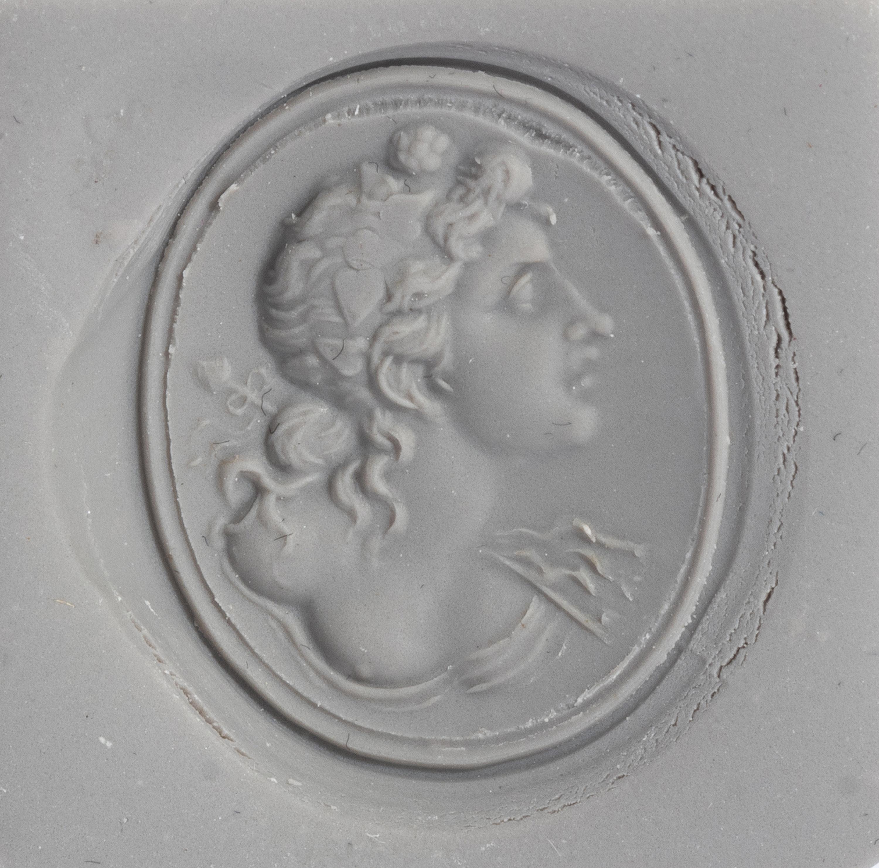 A Neoclassical Amethyst and Gold Finger Ring with the God Dionysos