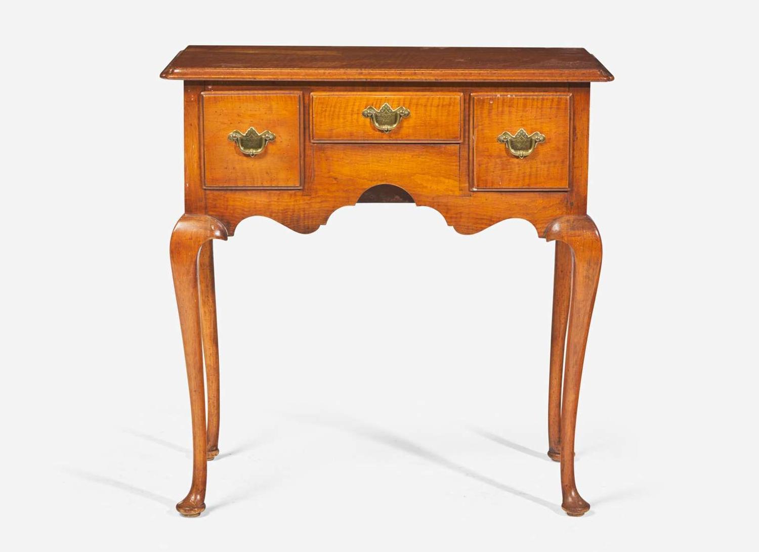 A Queen Anne style tiger maple dressing table, early 20th century