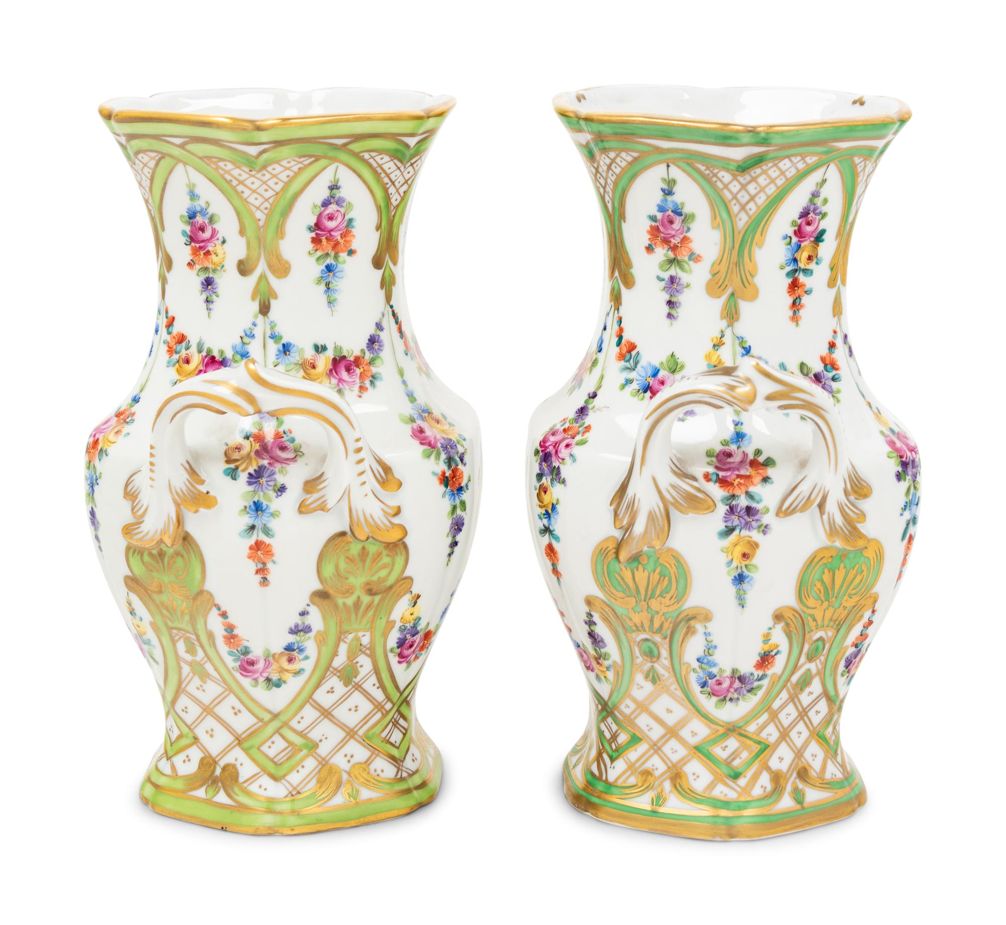 A Pair of Dresden Porcelain Urns
