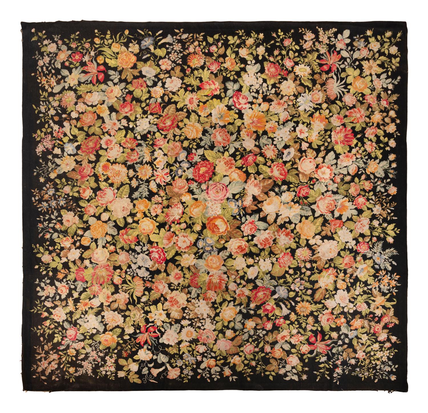 A Floral Needlepoint Rug