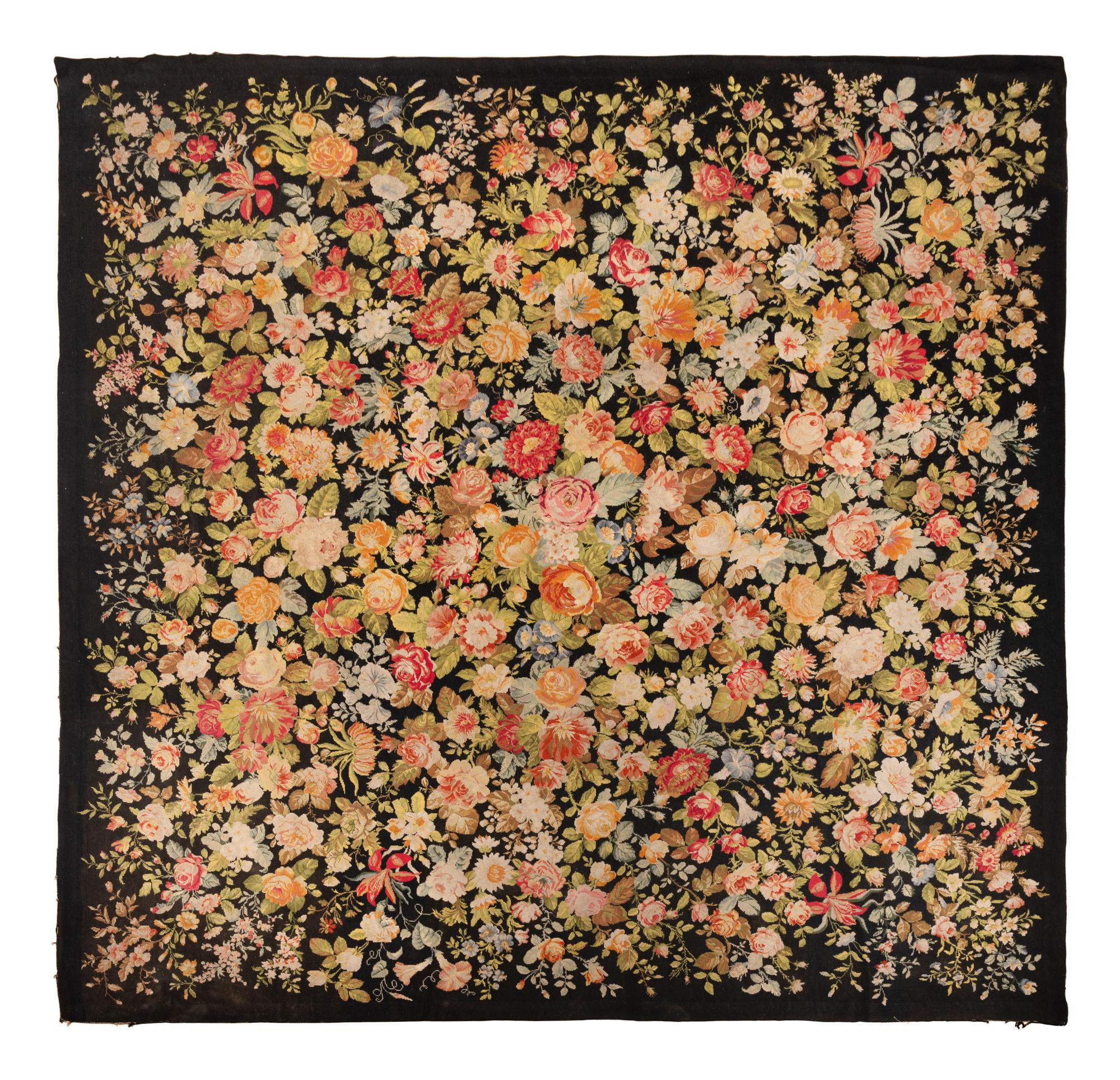 A Floral Needlepoint Rug