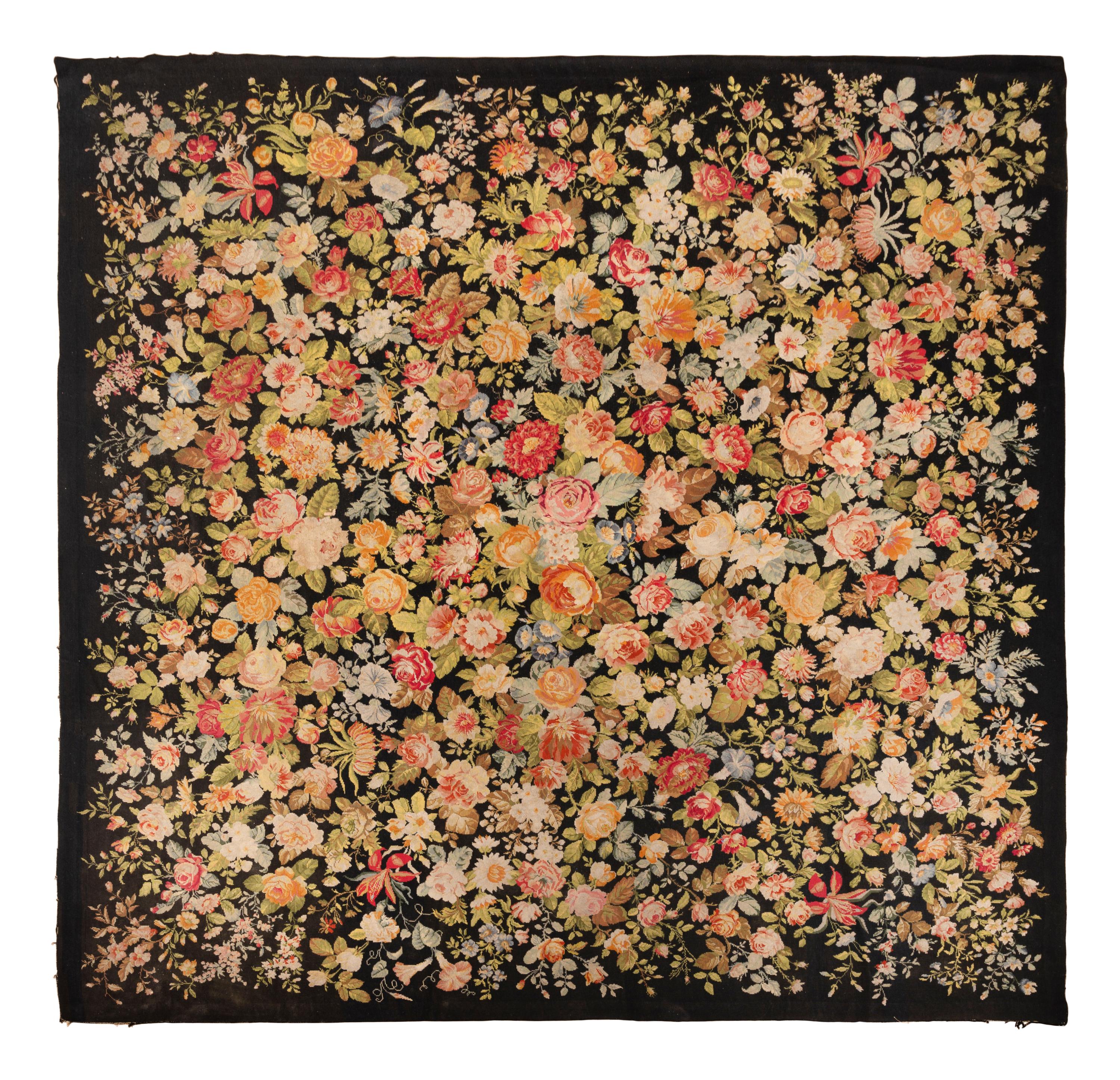 A Floral Needlepoint Rug