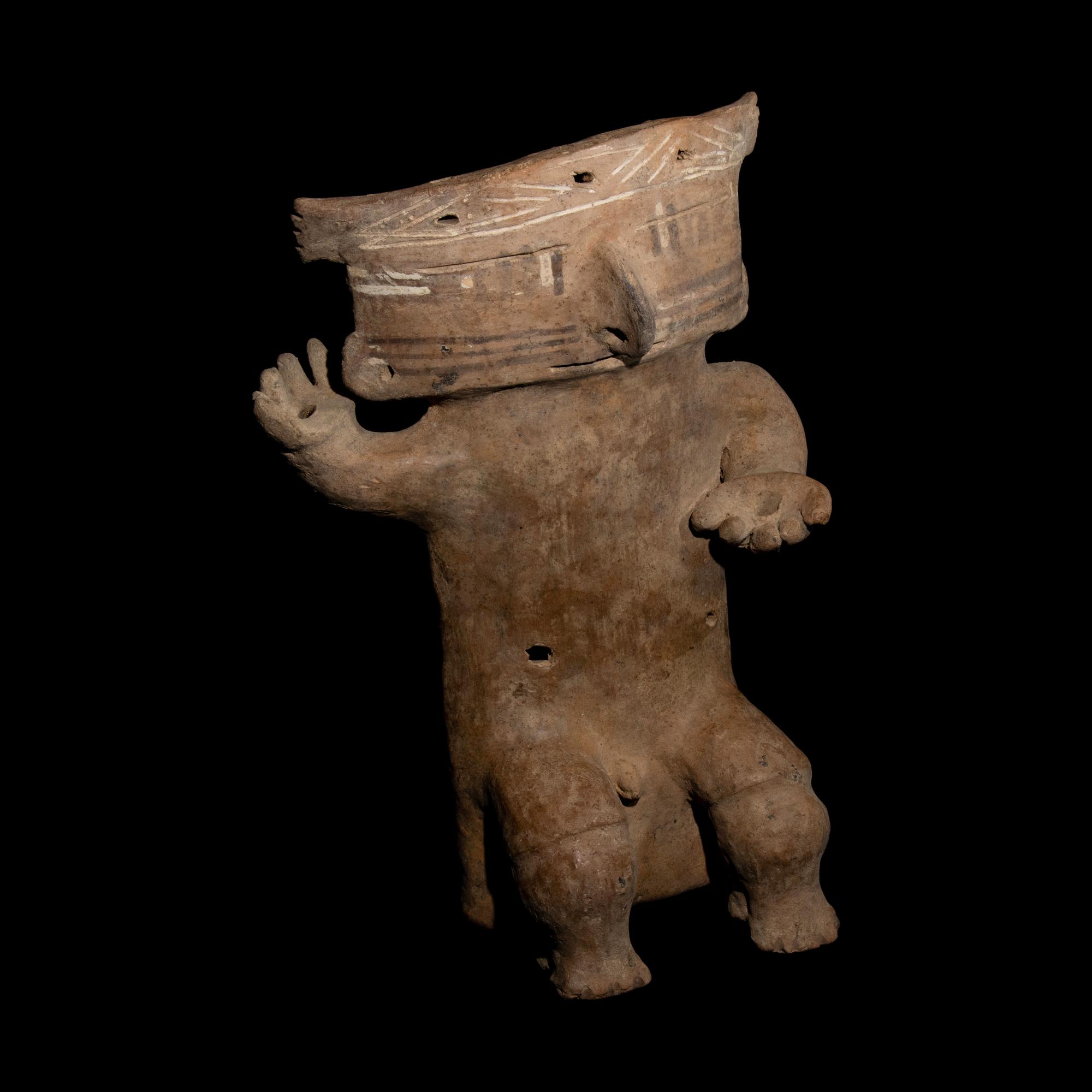A Quimbaya Terracotta Seated Figure