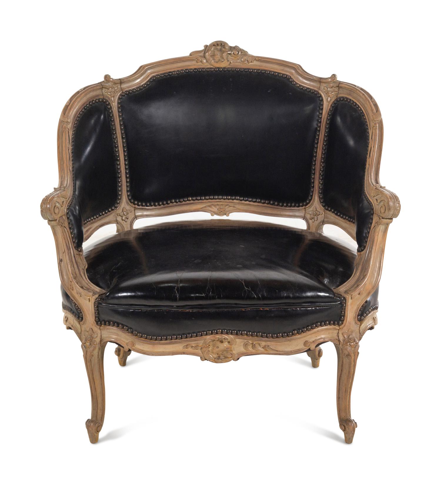 A Louis XV Style Painted and Black Leather Upholstered Bergère