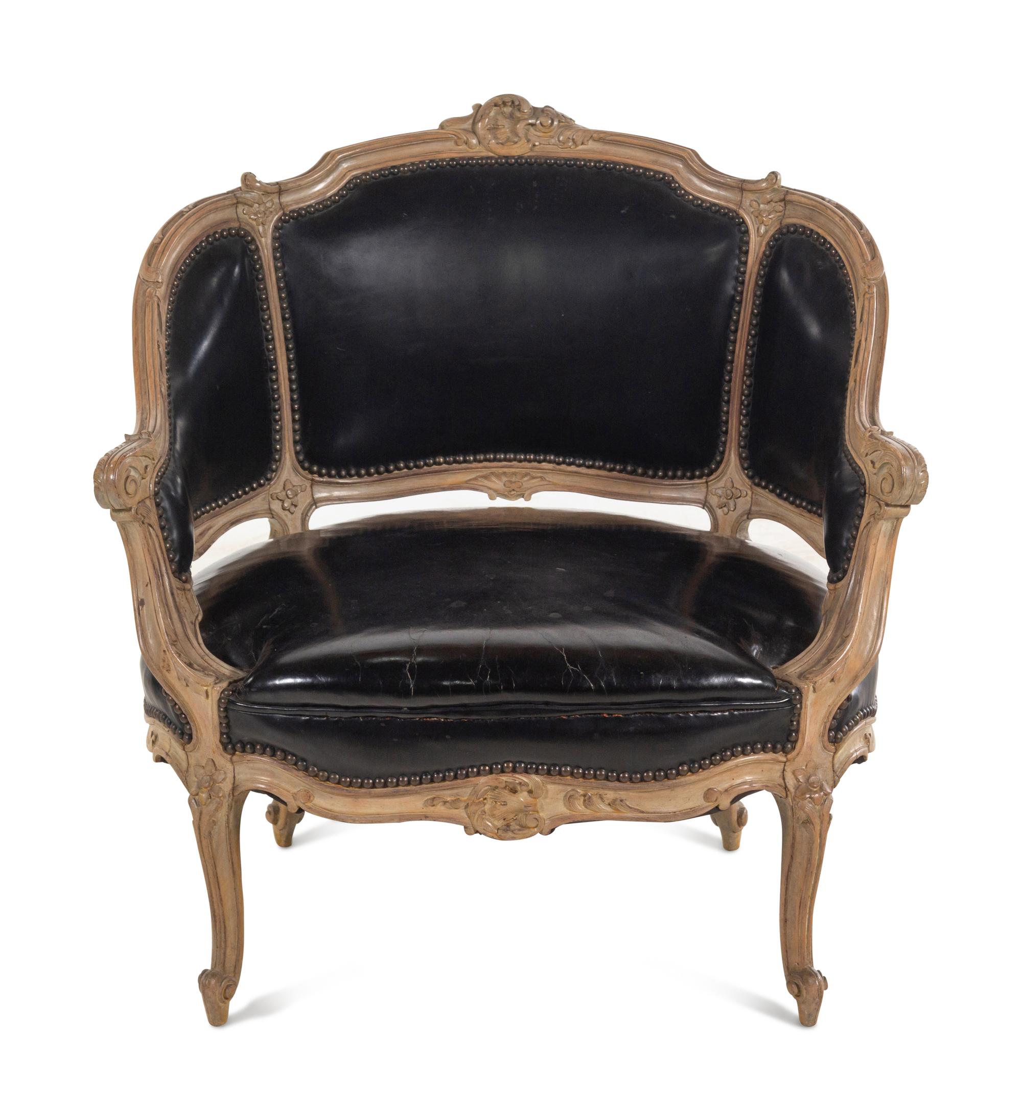 A Louis XV Style Painted and Black Leather Upholstered Bergère