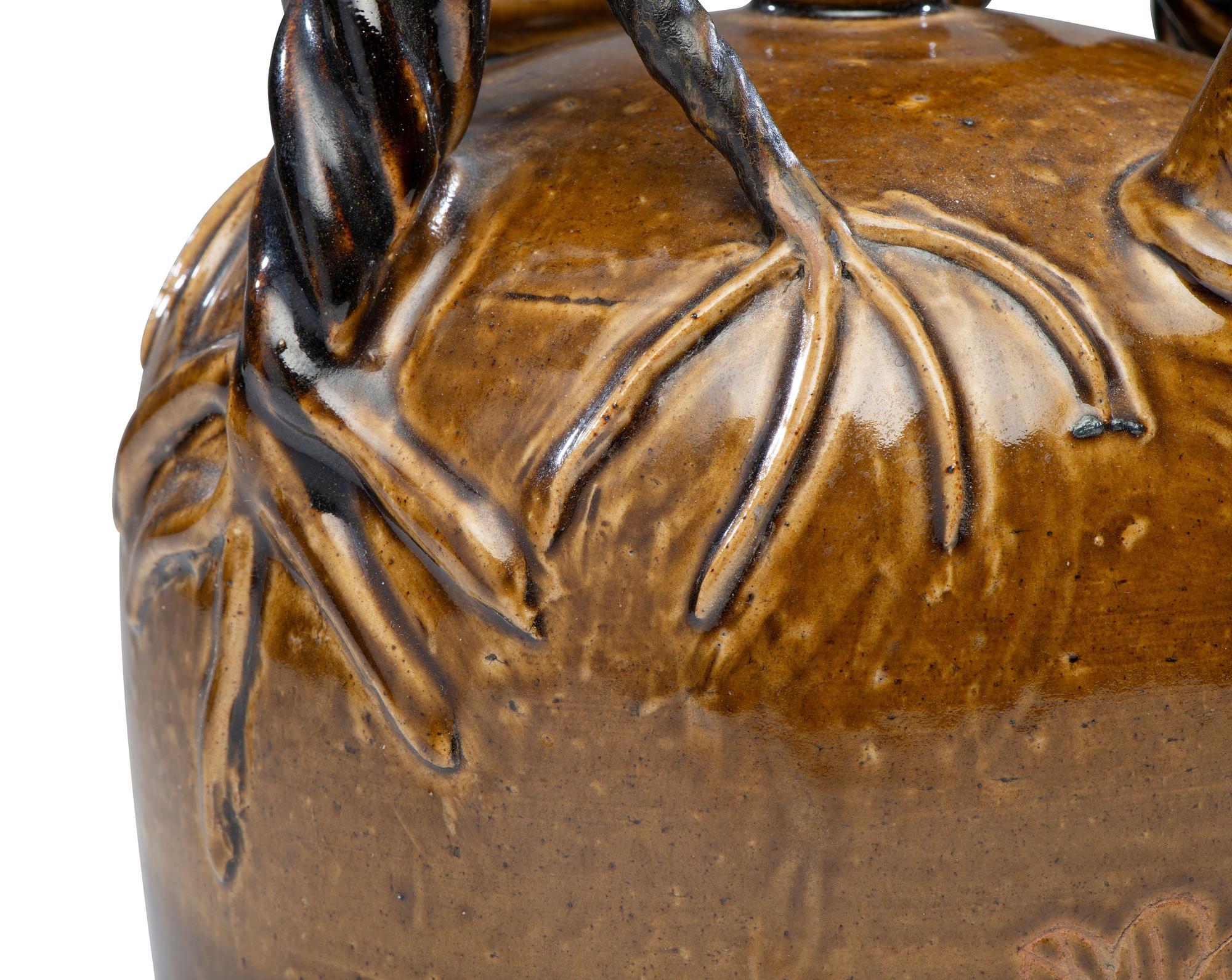 A Rhodenbaugh Stoneware Harvest Jug