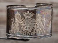 George III Era Sterling Silver Armbands and British Officer's Gilt Copper Gorget, Presented to Ojibwa Chief John Aisance
