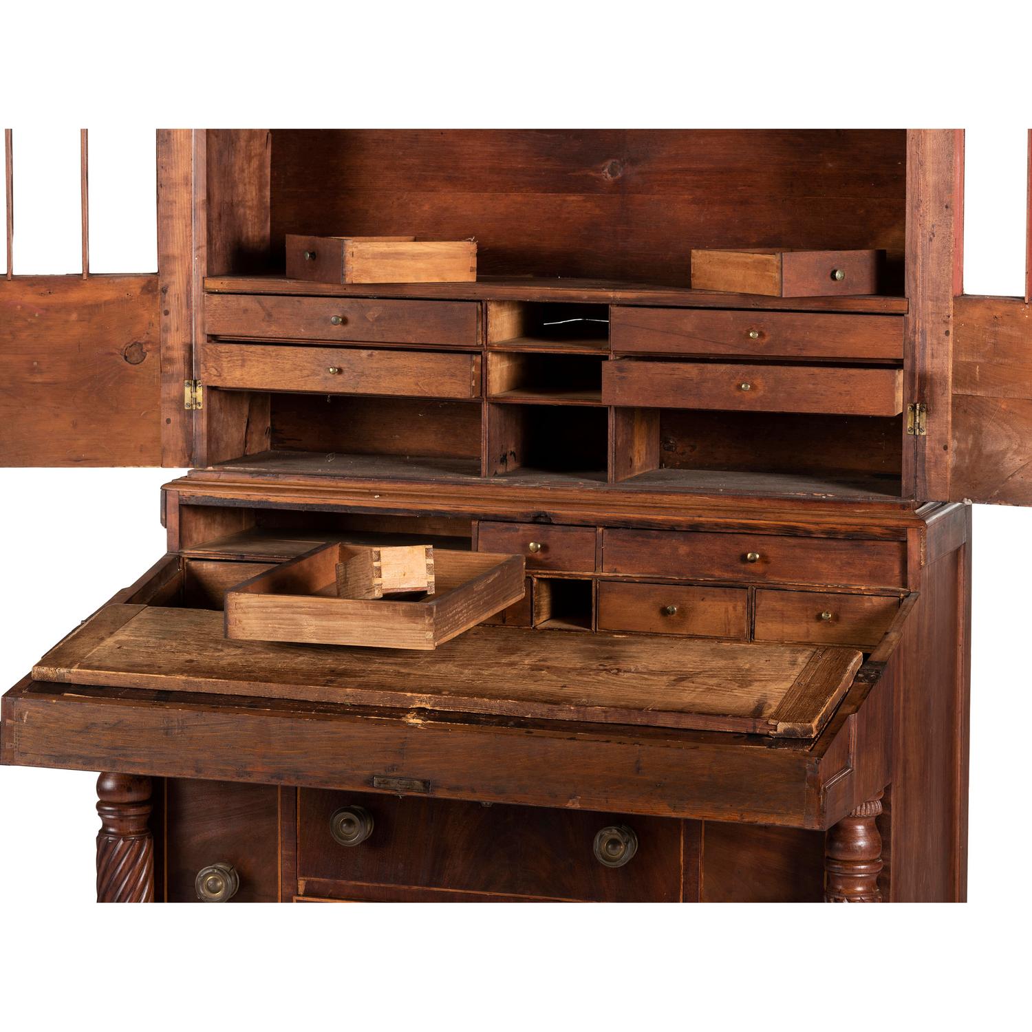 A Classical Figured Maple and Mahogany Desk-and-Bookcase