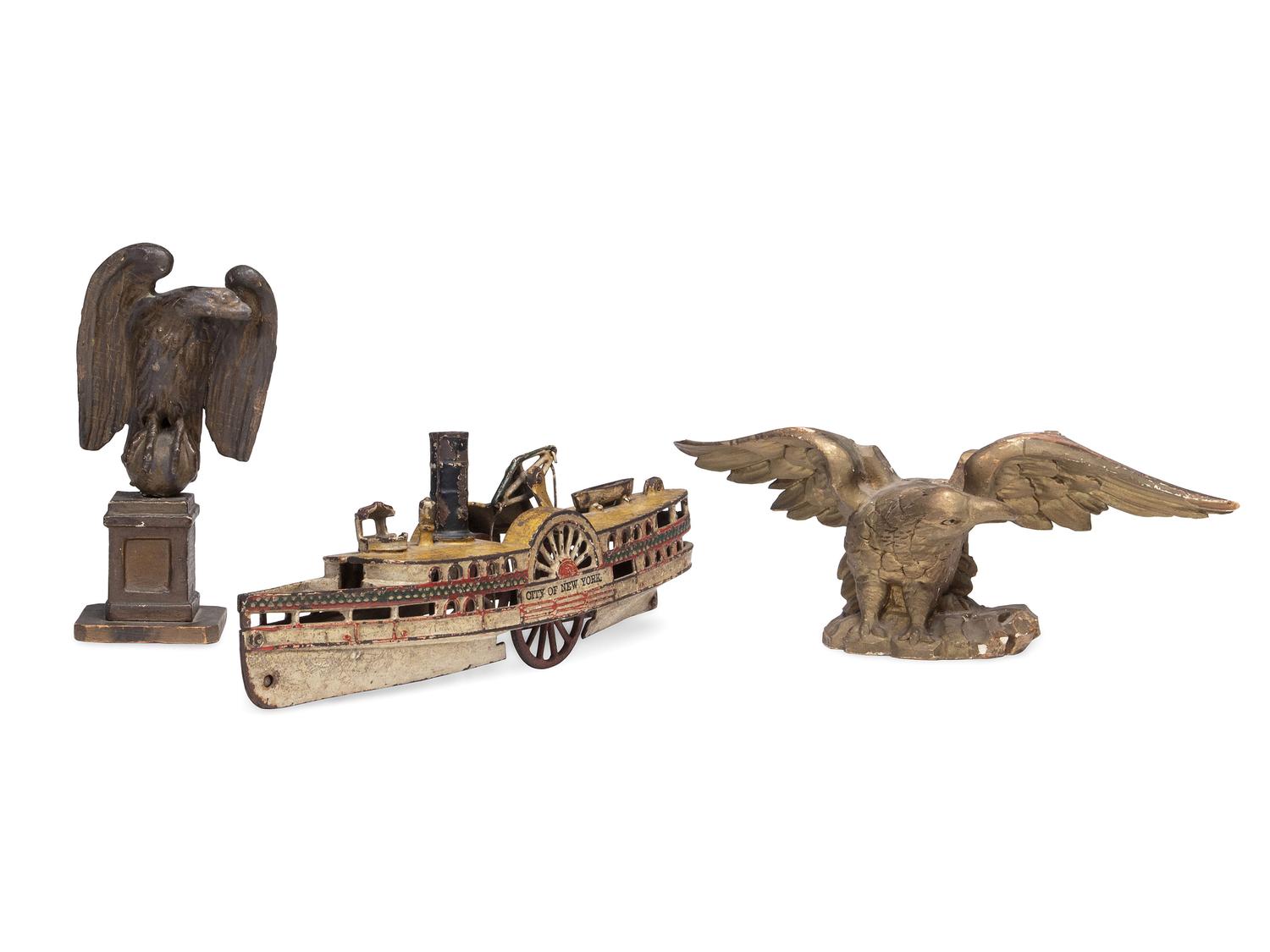 Two Carved and Painted Wood Eagle Finials, and a Cast Iron Paddleboat Boat Toy