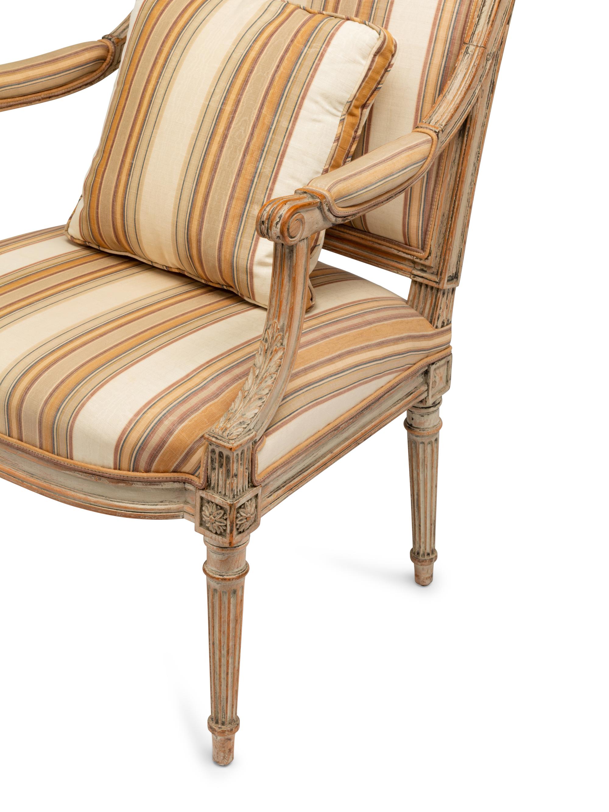 A Pair of Louis XVI Gray-Painted Fauteuils