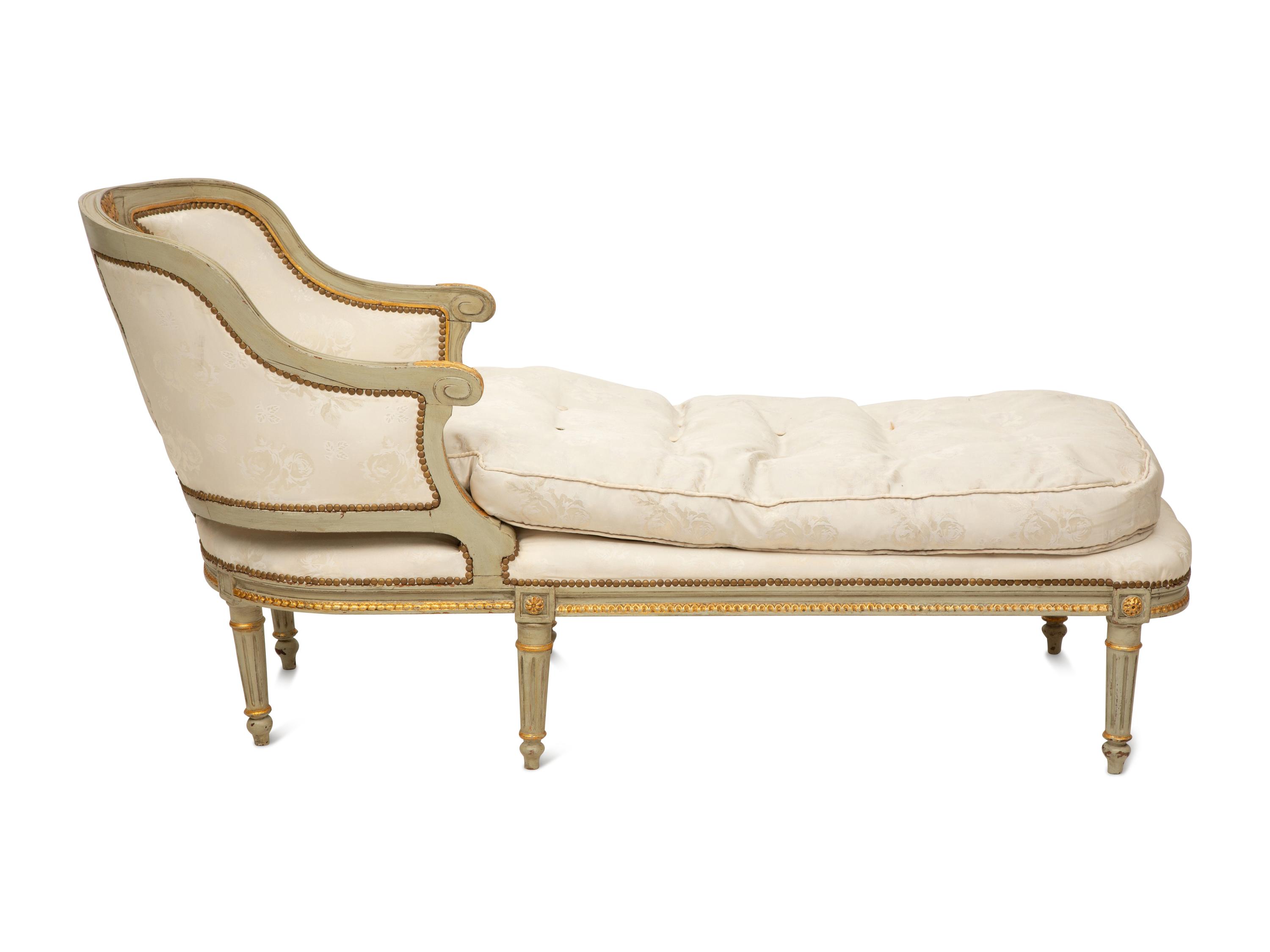 A French Provincial Style Painted and Parcel Gilt Chaise Longue
