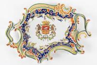 A Continental Faience Plate Width 11 1/2 inches.