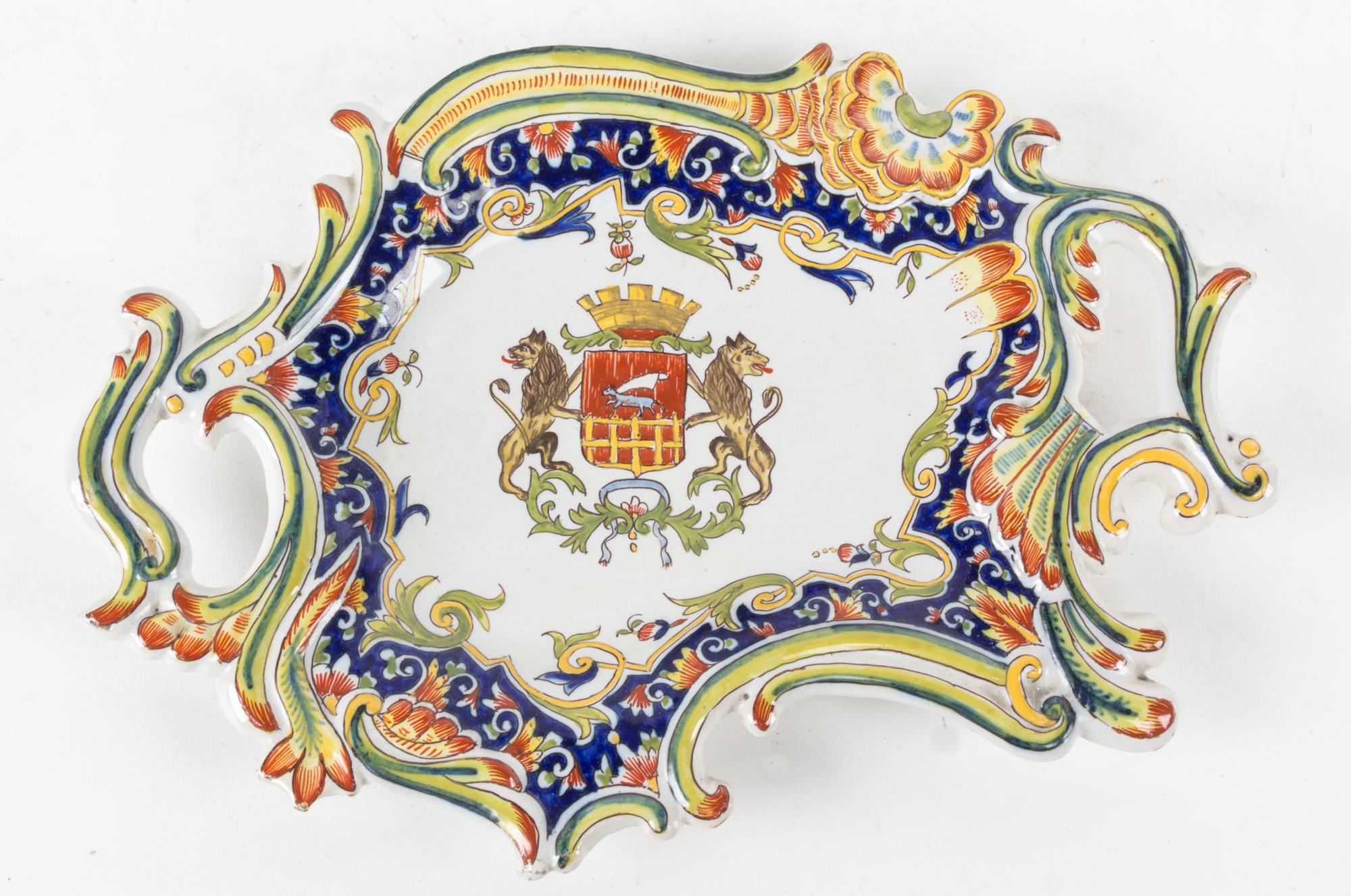 A Continental Faience Plate Width 11 1/2 inches.