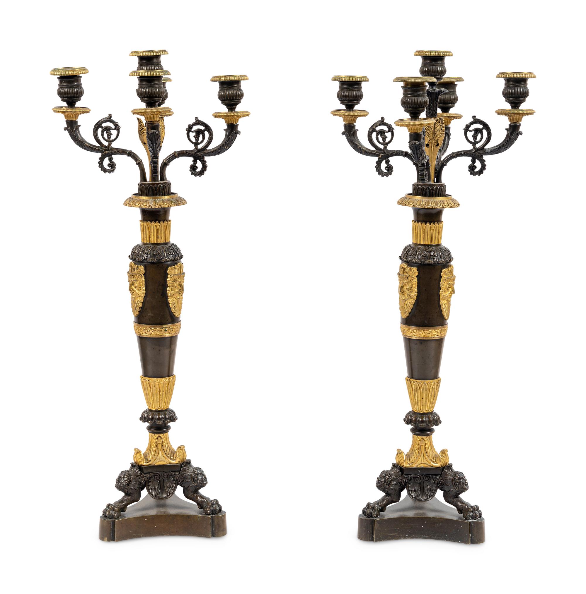 A Pair of Louis Philippe Gilt and Patinated Bronze Five-Light Candelabra