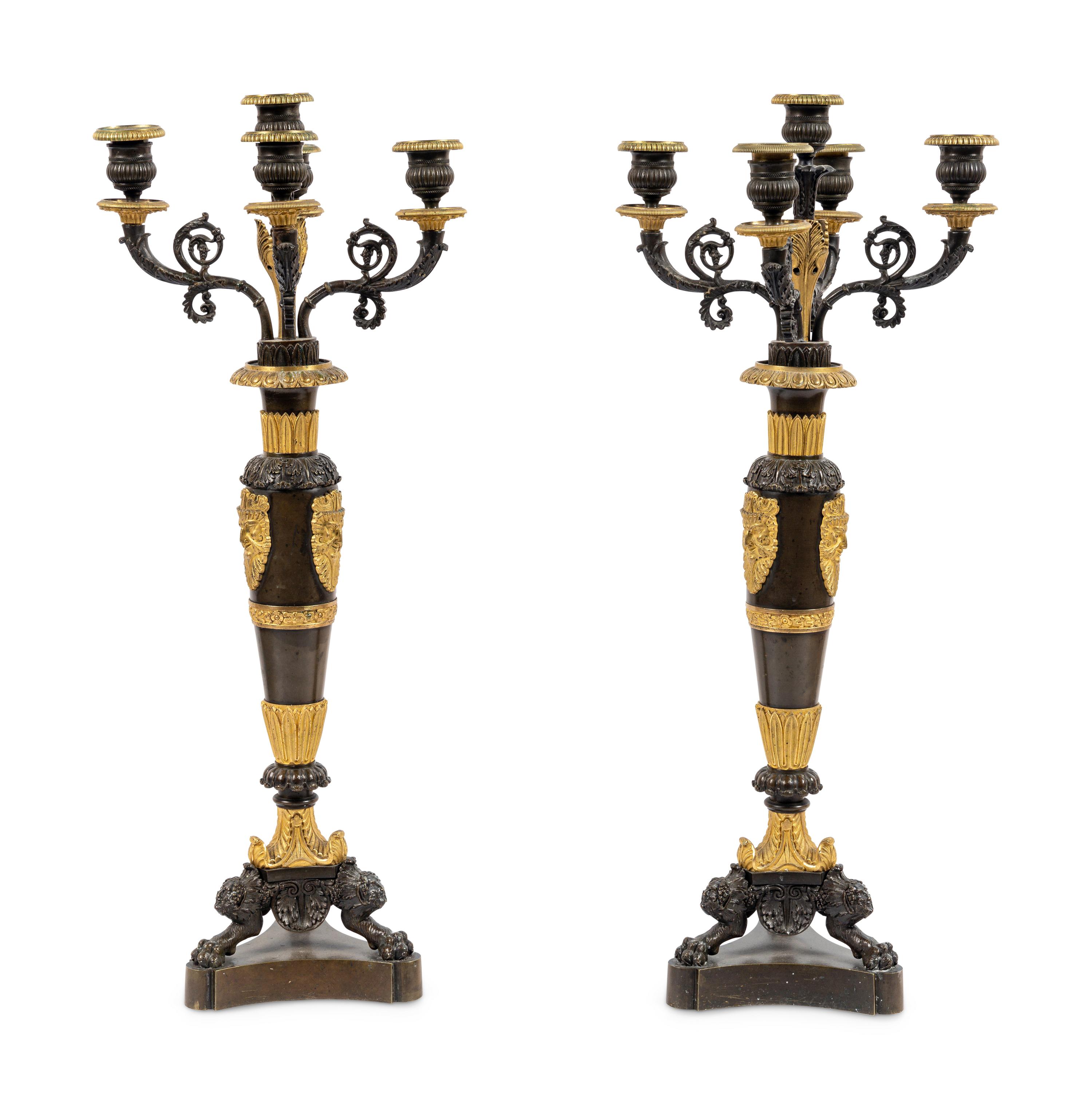 A Pair of Louis Philippe Gilt and Patinated Bronze Five-Light Candelabra
