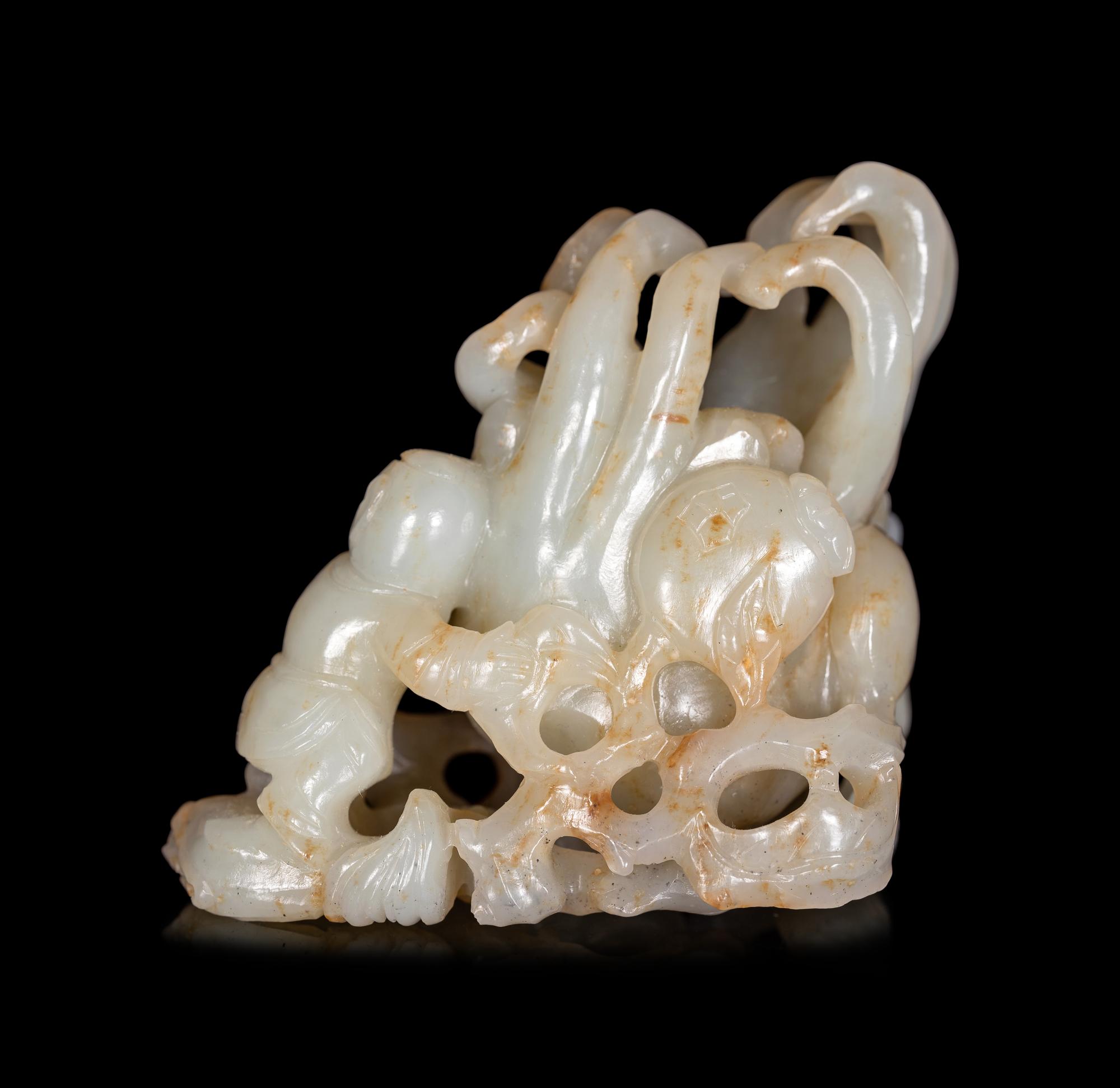 A Celadon Jade Figural Group