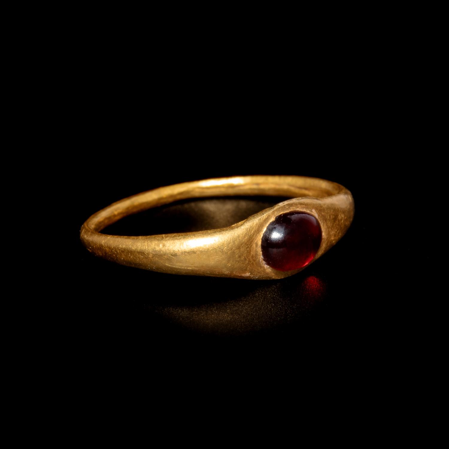 A Roman Gold and Garnet Finger Ring