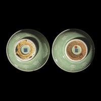 A Pair of Chinese Incised White Slip Decorated Celadon Ground Porcelain 'Bogu' Bowls, 18th/19th Century — 清中期 豆青地堆白博古图碗一对
