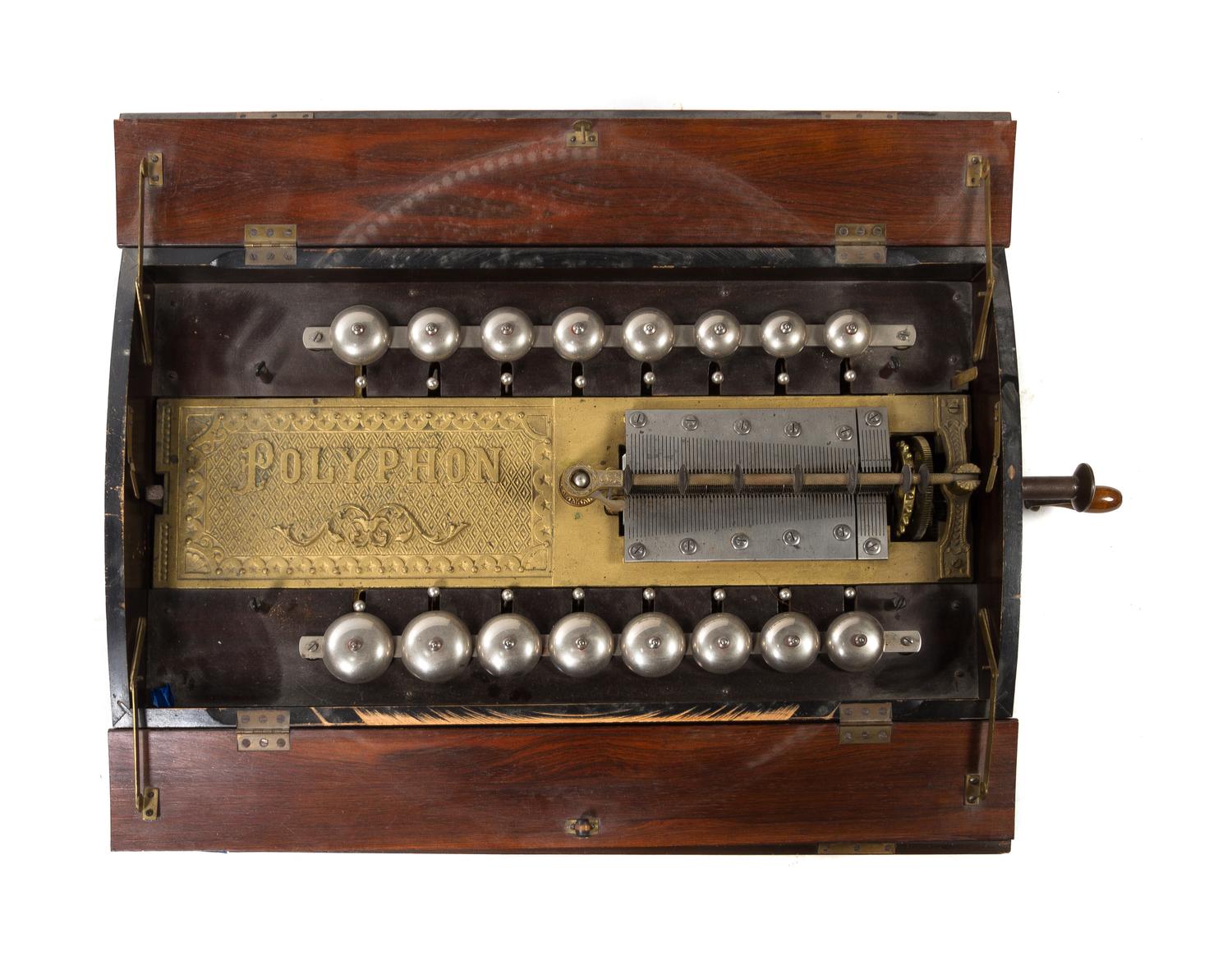 A Polyphon Disk Music Box Diameter of discs 22 inches.