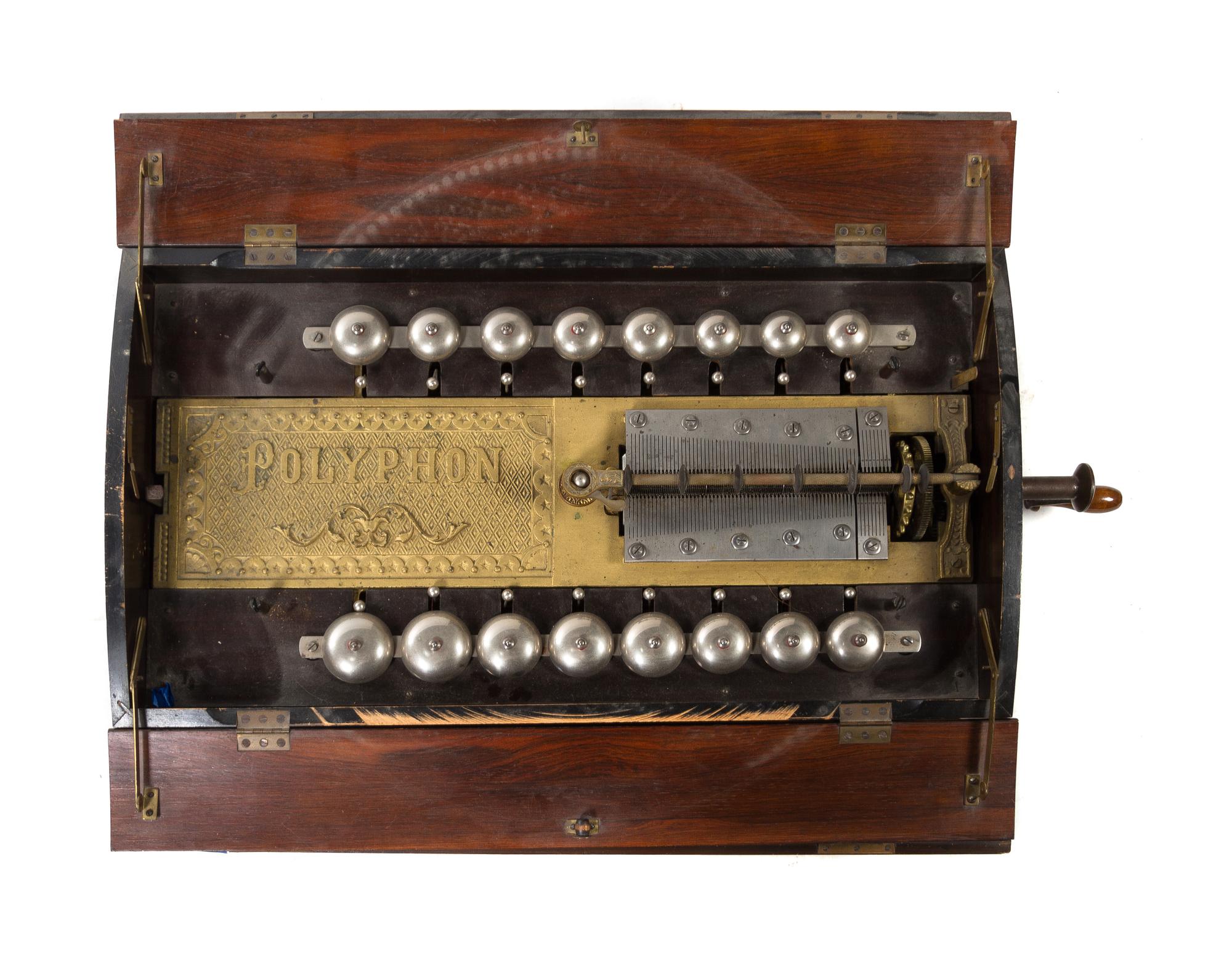 A Polyphon Disk Music Box Diameter of discs 22 inches.