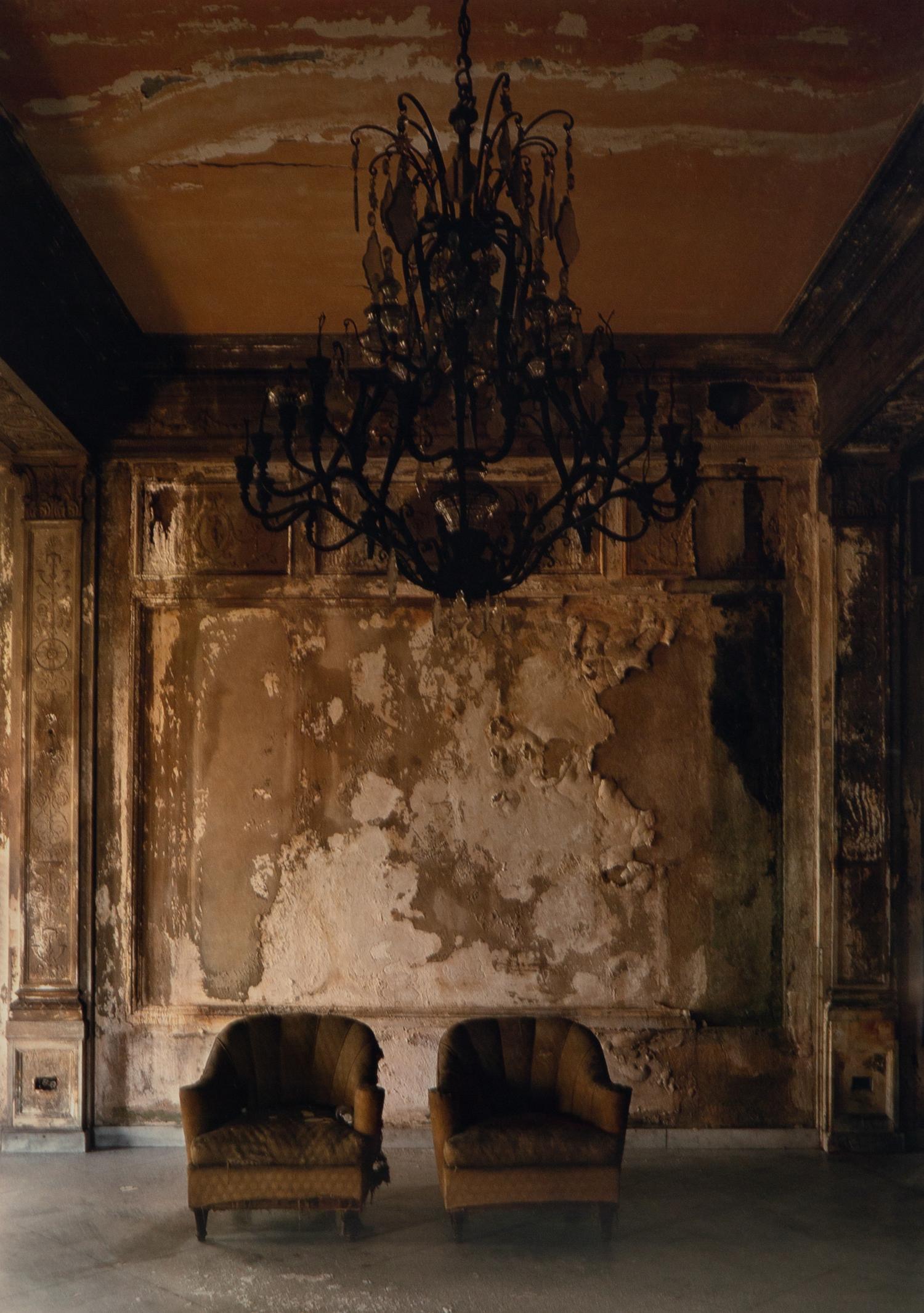 A pair of photographs ( Isabella's Two chairs, 1999; and Woman in Doorway, 1999 )