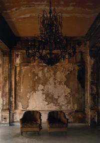 A pair of photographs ( Isabella's Two chairs, 1999; and Woman in Doorway, 1999 )
