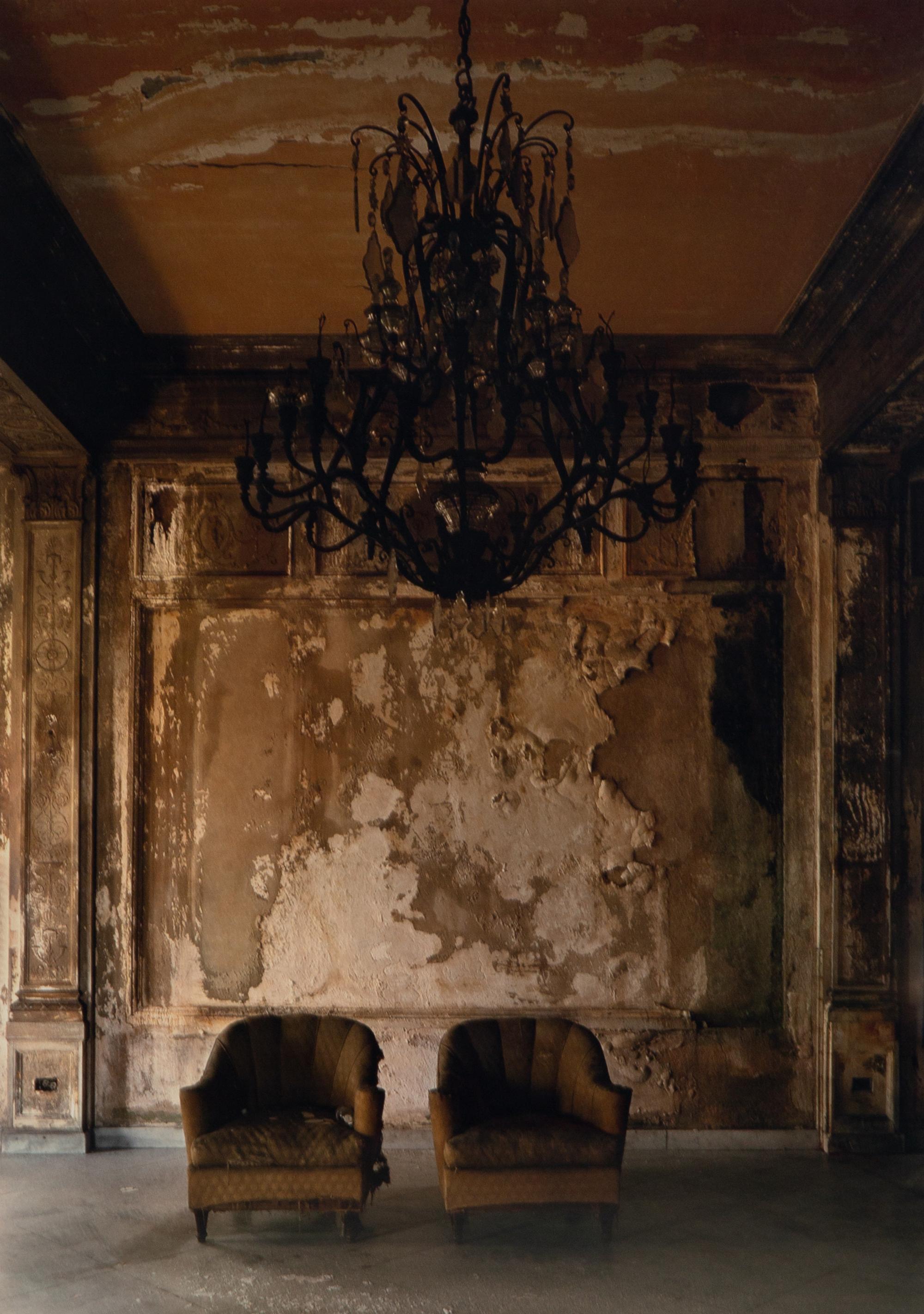 A pair of photographs ( Isabella's Two chairs, 1999; and Woman in Doorway, 1999 )