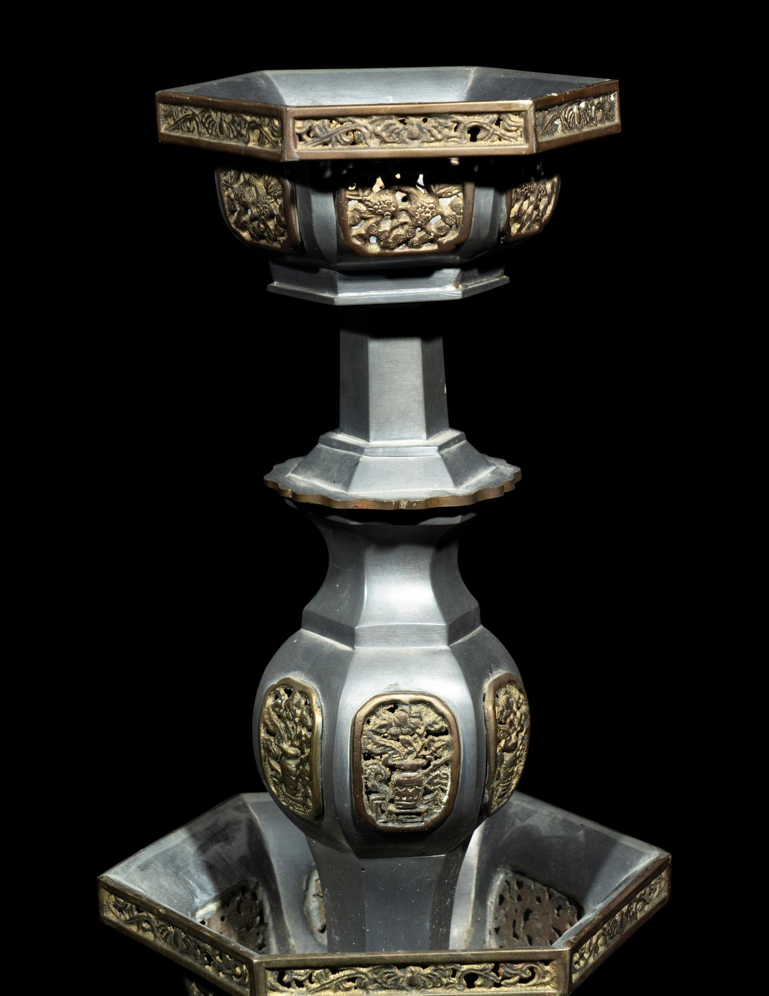 A Pair of Chinese Pewter Candle Holders