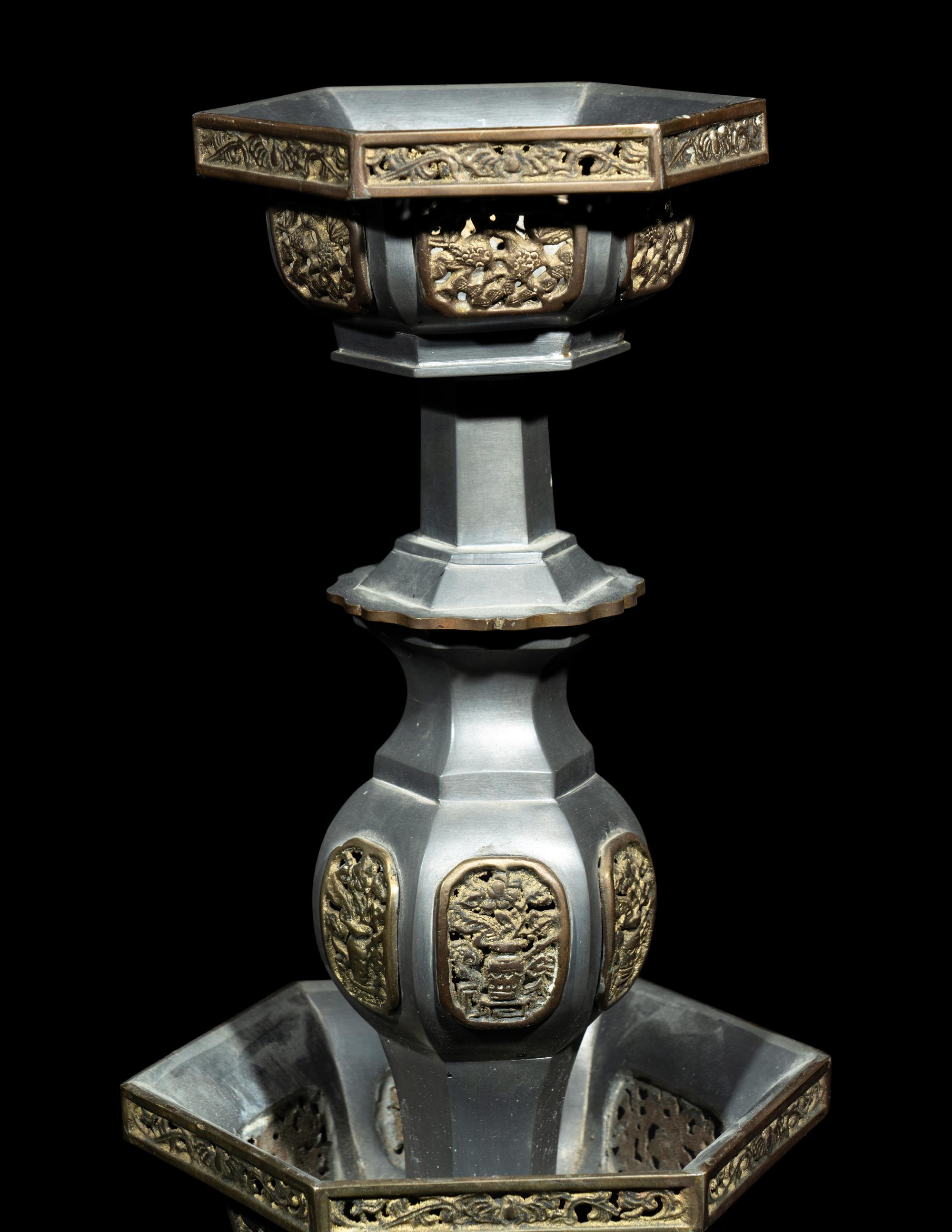 A Pair of Chinese Pewter Candle Holders