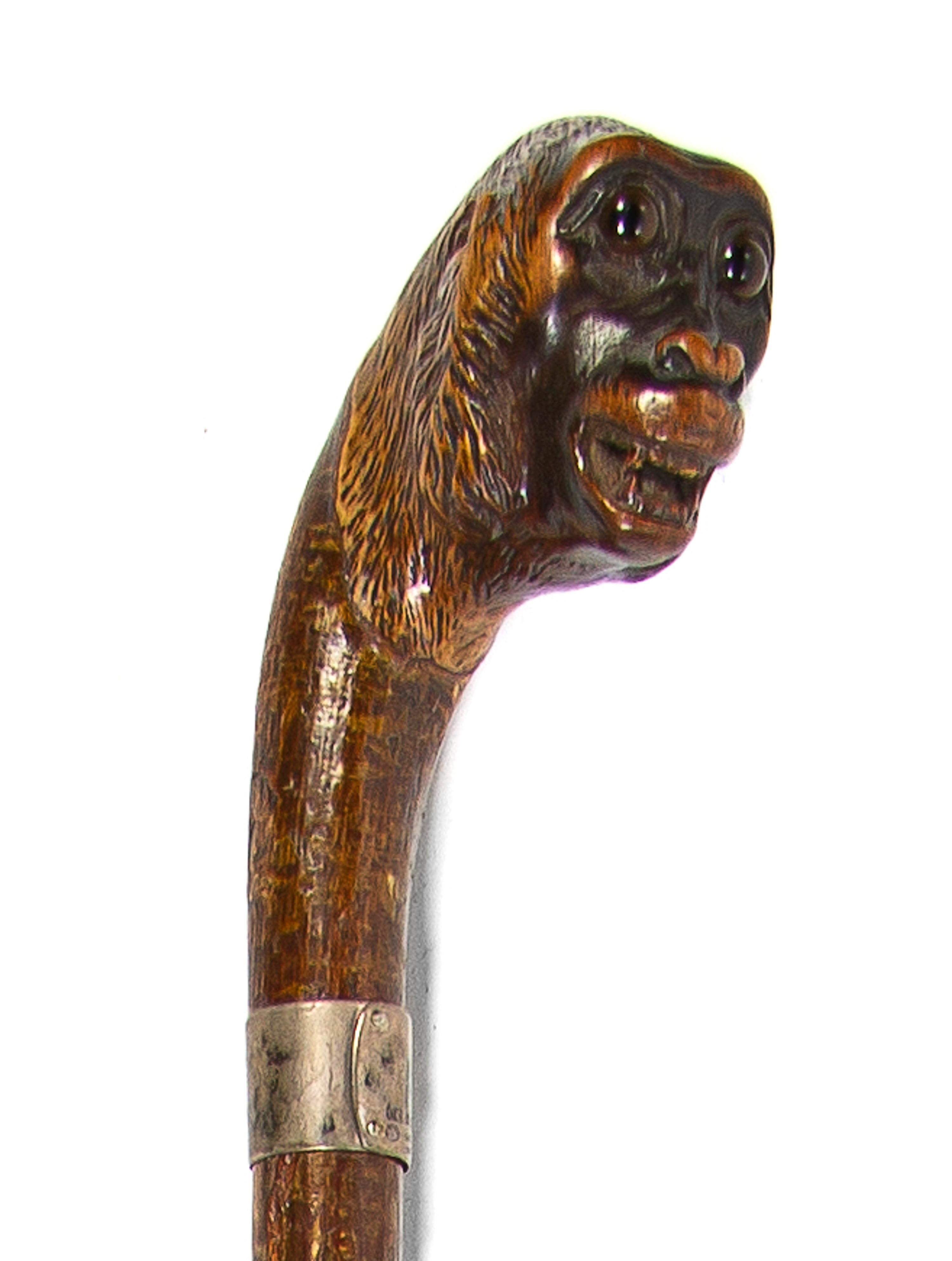 An English Silver Mounted Animalier Cane, Charles Cooke, Height overall 35 1/2 x height of head 2 1/4 inches.