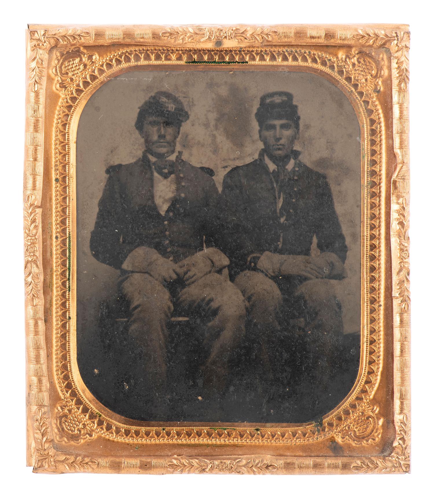 [CIVIL WAR]. Sixth plate tintype of a pair of cavalrymen wearing gauntlets and caps with insignia.