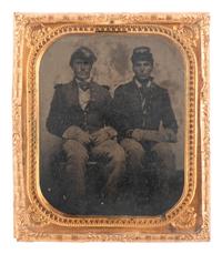 [CIVIL WAR]. Sixth plate tintype of a pair of cavalrymen wearing gauntlets and caps with insignia.