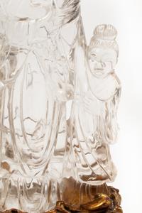 A Carved Rock Crystal Figure of Guanyin on a Giltwood Base
