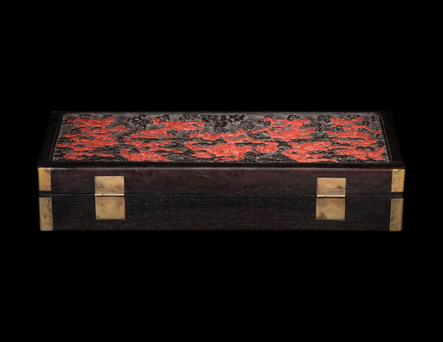 A Chinese Carved Red and Black Lacquer 'Dragon' Document Box