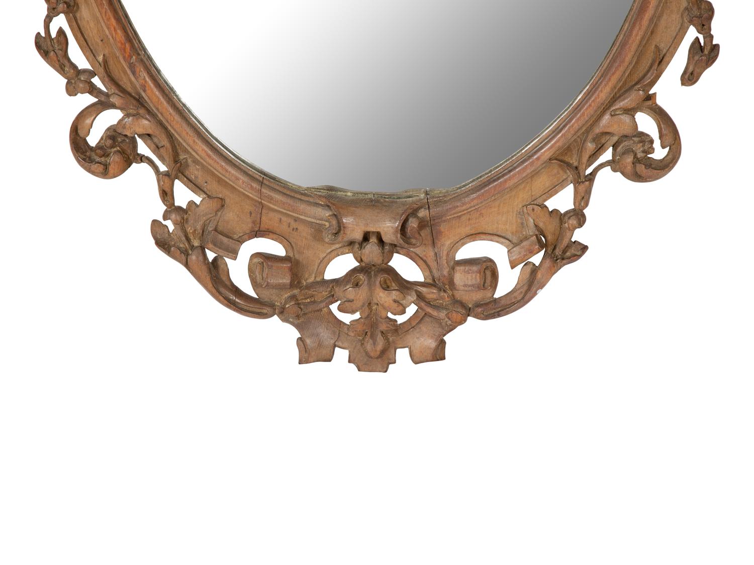 An Italian Baroque Style Carved Walnut Mirror
