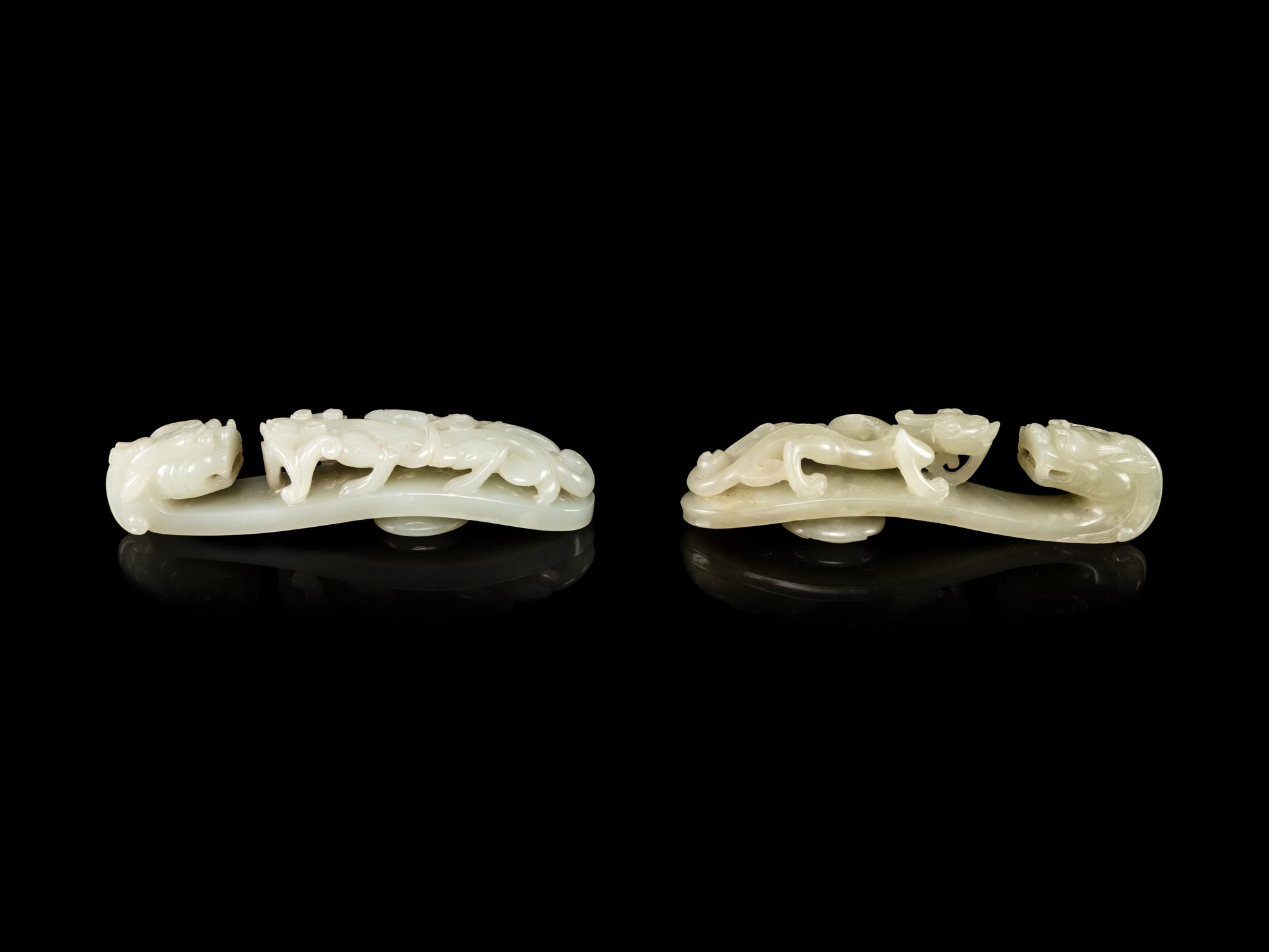 Two Celadon Jade Dragon-Head Belt Hooks