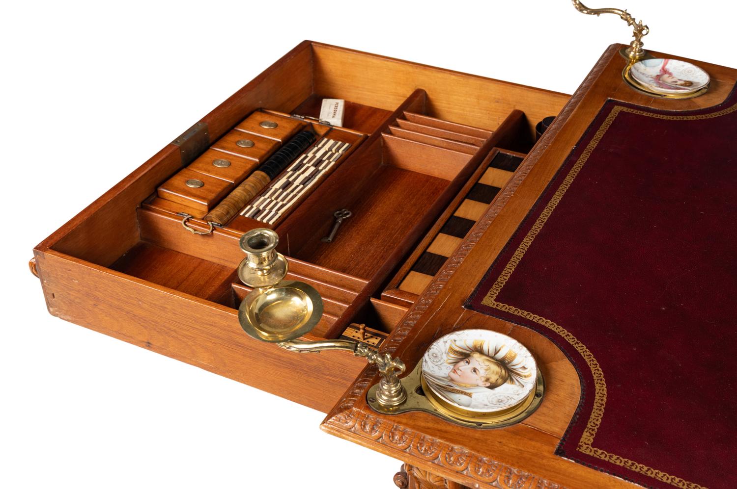 An Edwardian Oak Game Table
