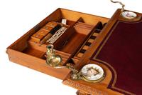 An Edwardian Oak Game Table