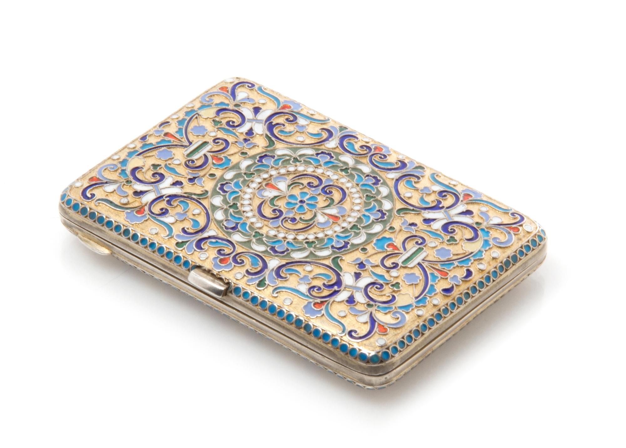 A Russian Enameled Silver-Gilt Cigarette Case, Mark of Nikolai Pavlov, Moscow, early 20th century, having a matted gilt base decorated
