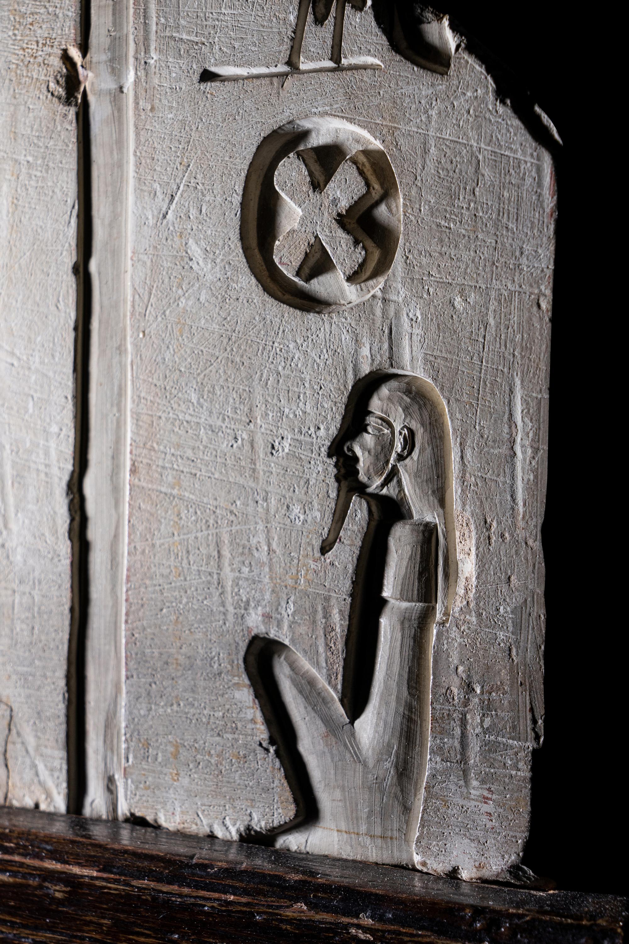 An Egyptian Limestone Relief Fragment