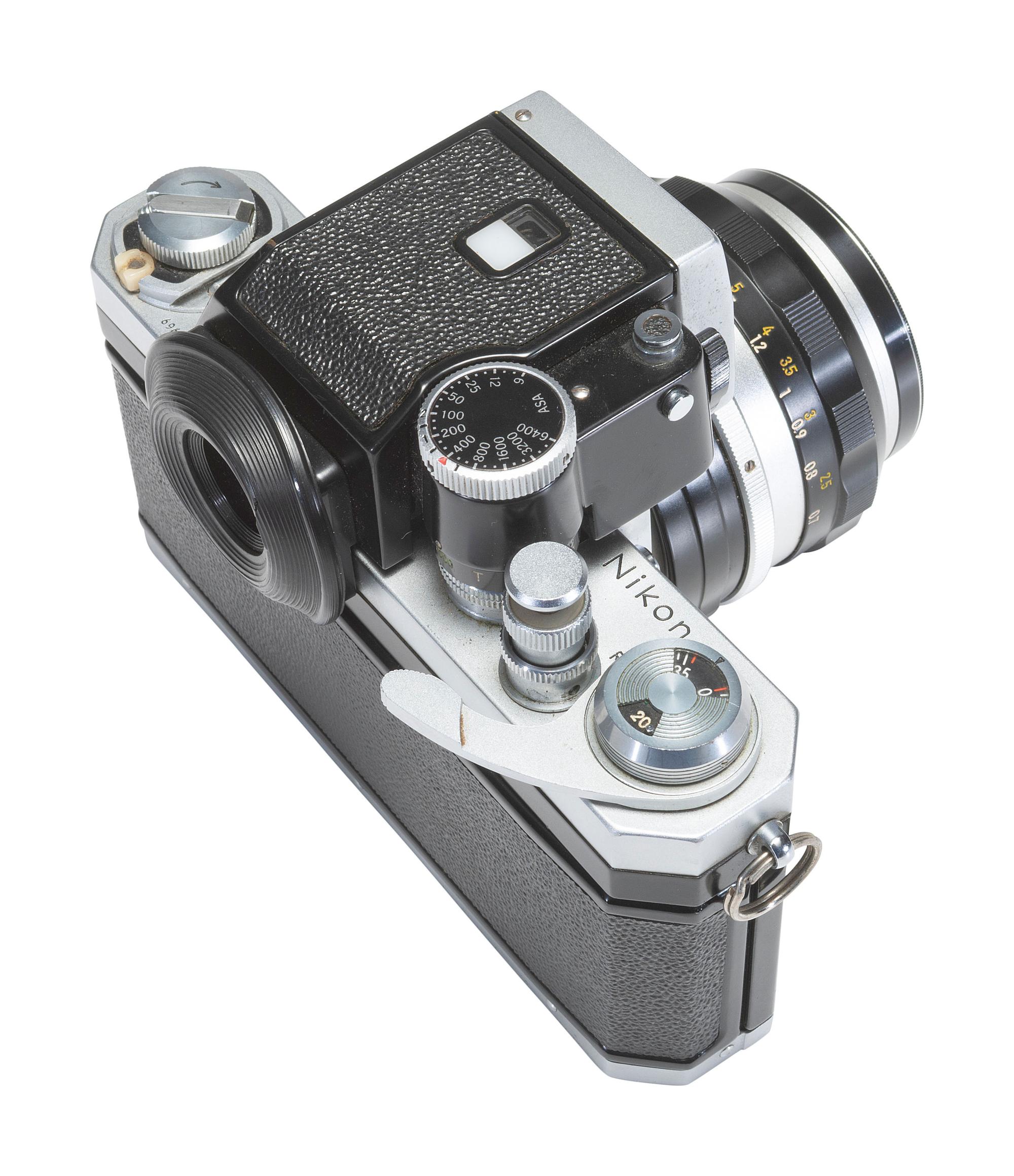 [CAMERAS]. Nikon F 35mm camera outfit with additional lenses and other accessories.