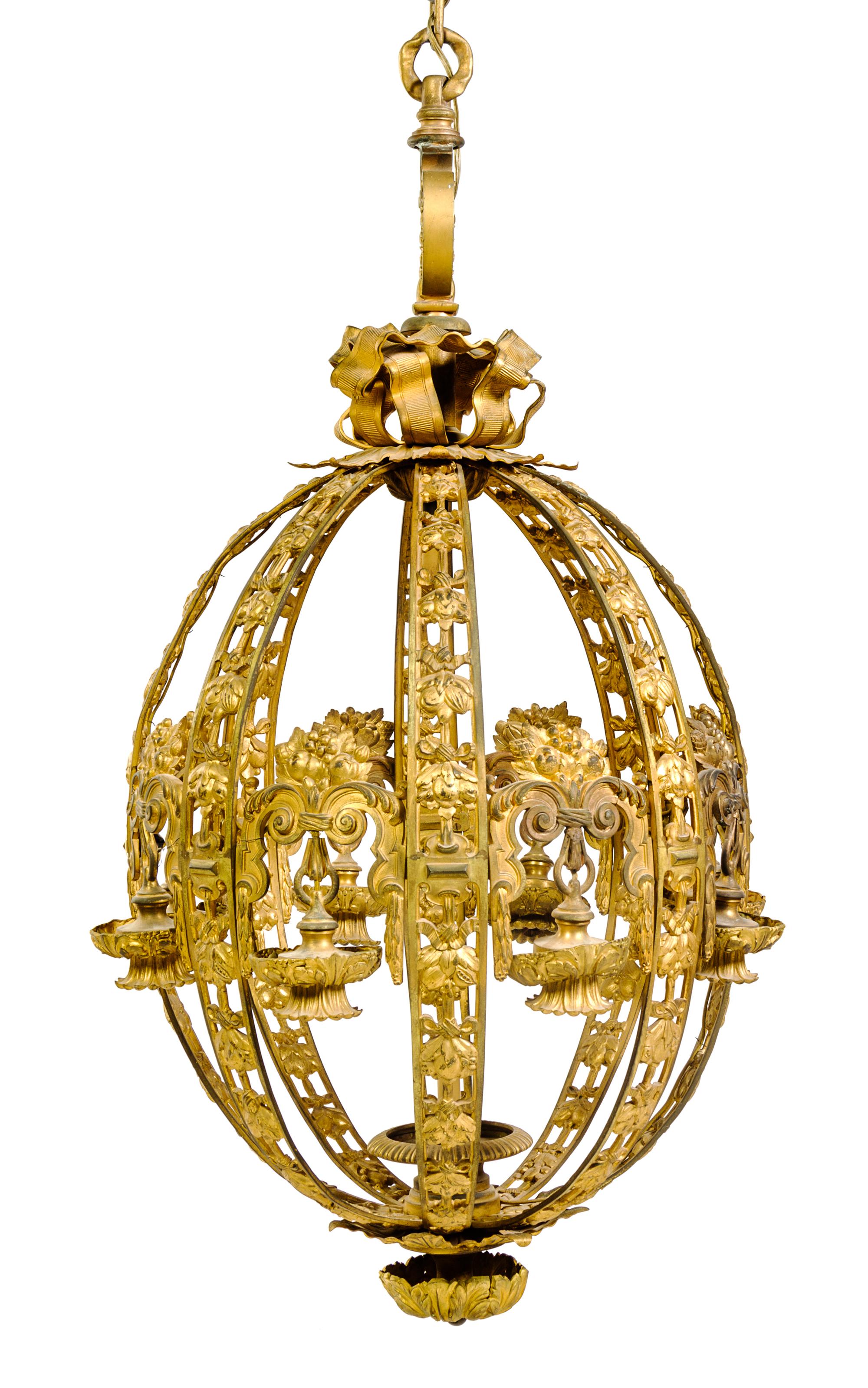 An American Gilt Bronze Ten-Light Chandelier Height 44 x diameter 26 1/2 inches. — EDWARD F. CALDWELL & CO., NEW YORK, EARLY 20TH CENTURY
