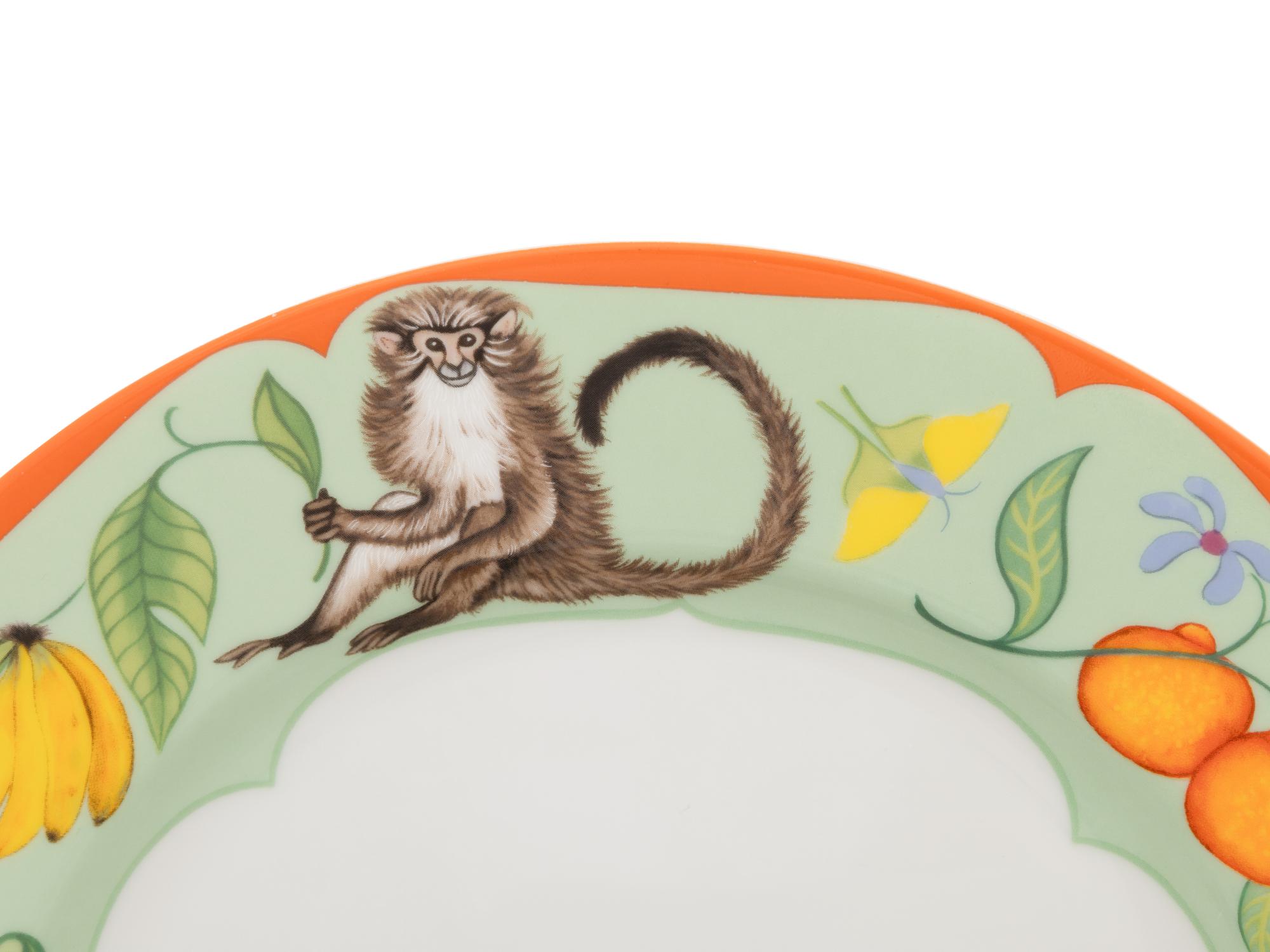 A Lynn Chase Monkey Business Porcelain Dinner Service