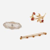 A Collection of Three Gem-Set Brooches