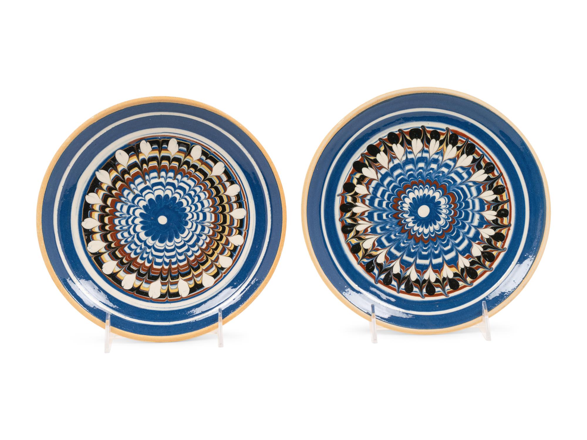 A Pair of Continental Mocha Ware Style Plates