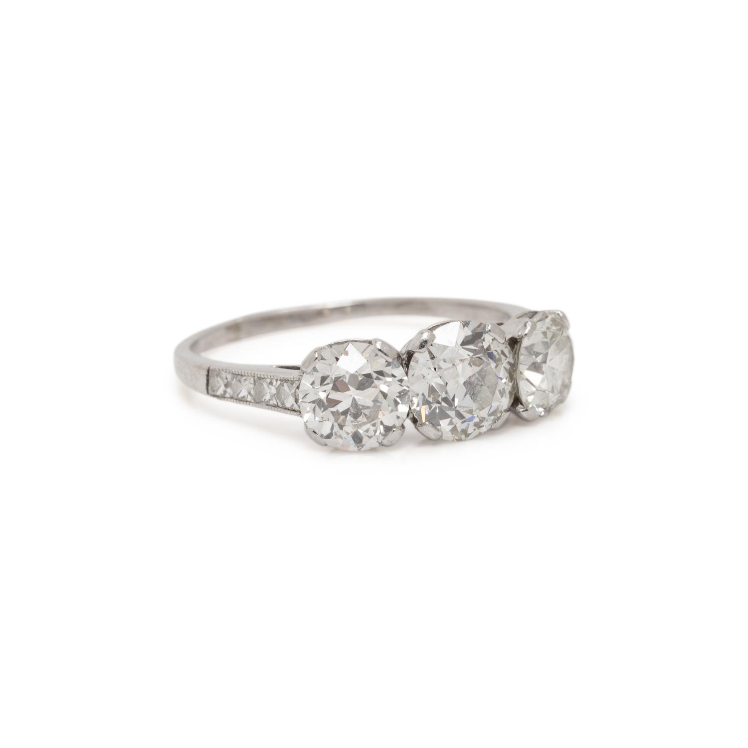 ANTIQUE, THREE STONE DIAMOND AND PLATINUM RING